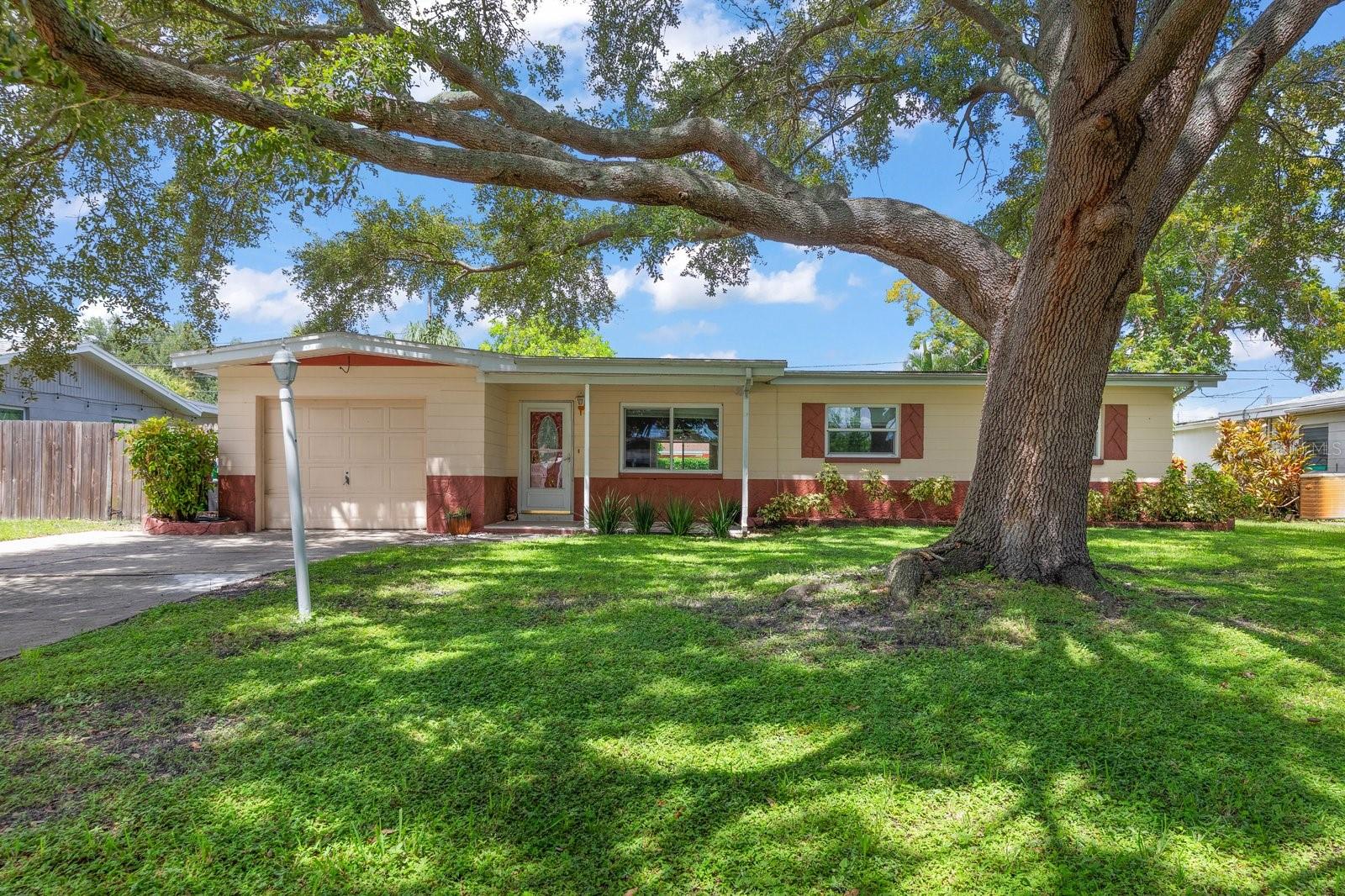 Welcome to this well-maintained 3-bedroom, 2-bath home with a 1-car garage, ideally located in the desirable Floral Gardens neighborhood of Largo. Move-in ready and full of updates, this home features porcelain and ceramic tile flooring throughout, fresh interior paint, and a convenient inside utility room. The kitchen is equipped with all-new appliances, and both bathrooms have been tastefully updated. Major improvements include a 2-year-old water heater and all-new A/C ductwork installed this year. The A/C system is approximately 6 years old, and the roof is approximately 14 years old. Situated high and dry in a non-flood zone. Step outside to a spacious backyard offering plenty of room to add a pool, garden, or create your own Florida outdoor oasis. The patio provides the perfect spot for morning coffee, weekend barbecues, or simply relaxing outdoors. Conveniently located near shopping, dining, Largo Central Park, and just a short drive to the beautiful Gulf beaches. With its updates, generous backyard, and convenient location, this Floral Gardens home is ready for its next owner! A great opportunity to enjoy comfortable Florida living with a perfect Largo location!