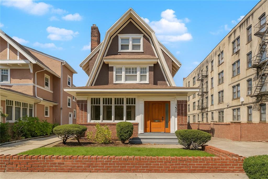 Welcome to 1917 Glenwood Road. Enter into a meticulously maintained, 1920 Dutch Colonial Revival with 8 Beds, 3 Baths and detached garage on a 40' x 160' lot sited on a beautiful tree-line block in Fiske Terrace-Midwood Park. 
 
Over 3,300 sq ft of flexible living space spread over 4 floors. Generously sized light filled rooms, original craftsman detailing, woodwork and marquetry inlayed floors throughout. 
 
First Floor. Enclosed and heated Sunroom (full house width) with panoramic windows. Central formal Living Room with fireplace. Adjacent, generous sitting area. Stair Hall with grand winding banister staircase. Gracious, oversized formal dining room. Enormous eat-in Kitchen with true professional set up including expansive countertop and prep space, central fridge, generous cabinets and pantry space. 
 
Second Floor. Three spacious light filled bedrooms. The oversized primary has large walk-in closet area. Oversized bathroom with separate deep shower, bathtub alcove with stained glass window and hip bath. 
 
Third Floor. Two king sized Bedroom with sitting area. Summer kitchen and bathroom. 

Basement. Fully renovated, insulated and climatized with windows throughout. The space has three additional rooms laundry area and a full bathroom with a separate entrance. Can be used as a home office, playroom, gym space etc. 

Location. a short distance from the Q and Express B trains at Newkirk Plaza (minutes to Manhattan). Convenient to retail and shops. Moments from Cortelyou Road’s vibrant restaurants & cafés. Historic Fisk Terrace, built between 1905 and 1914, is uniquely special in the city owing to its individual custom-built houses.