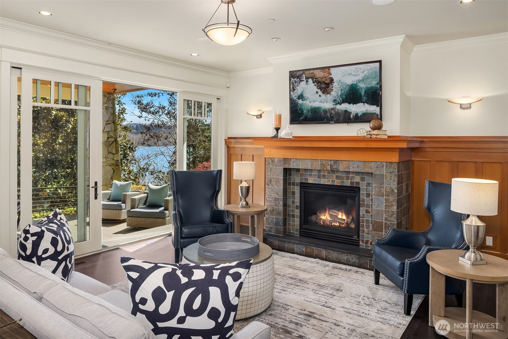More fun and games unfold in this fabulous bonus space grounded by a traditional Craftsman-style fireplace, rich in detail, warm in tone, and timeless in its appeal.