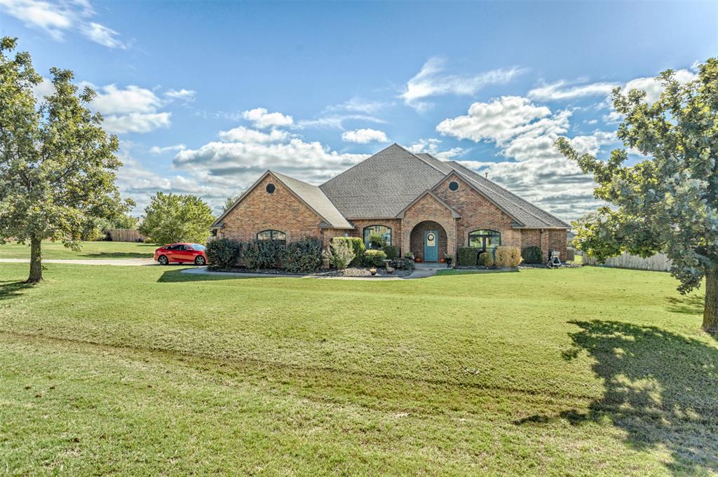 Newly listed, move-in ready 4-bedroom, 3-bath home on 0.8 acre in the desirable Deer Creek School District! Enjoy two living areas, a formal dining room, and a spacious, well-appointed kitchen with breakfast area. The primary suite features a private ensuite bath, separate toilet area, and walk-in closet. Three other bedrooms, one of which has a built-in Murphy bed offering flexible use as a study or guest room. Two additional full bathrooms, one on each side of the house completes the living space. Additional highlights include a 3-car garage with walk-in storm shelter and a fully insulated, air-conditioned 16' x 24' workshop. Private water well with softener and filtration system, plus aerobic septic. Recent updates include water heaters (2022 and 2026), one A/C unit (2022), and upgraded loft insulation (2019). Enjoy the family-friendly Summit community with neighborhood holiday celebrations and seasonal events. A wonderful combination of space, versatility, and neighborhood charm!