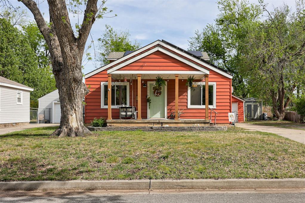 Campus area bungalow with so much charm AND so many updates!  Flexible 3 bed, 2 bath floor plan PLUS office/flex space off the kitchen.  Downstairs many rooms boast original (but refinished!) wood flooring.  Updated kitchen features beautiful wood tone cabinets appropriate to the style of the house as well as solid surface counters and tile splash; gas appliances, and the fridge may stay with the property! Large open living/dining area and so much natural light!  Two secondary bedrooms, office, one bath, and laundry also downstairs. Primary suite upstairs offers privacy and treehouse views; outfitted with a full bath and abundant closet space (even a laundry chute!!).  Major home system updates include newer roof, new windows, new HVAC system, new water lines (2019 ish), a new rear deck, and (free to you) solar panels!  Oversized 2 car detached garage with electric allows protection for 2 tandem vehicles, shop space, or both!  Easy access to Main Street or campus - a perfect place to call "home!"