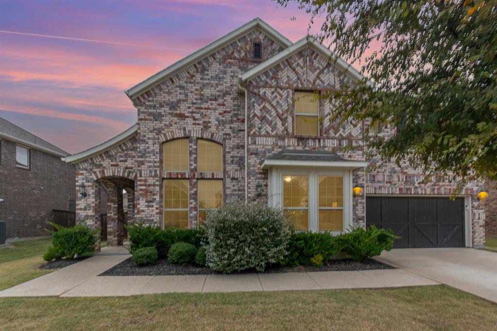 Absolutely stunning 5 bedroom 4.5 bath home in the highly sought after Hills at Legacy community in Prosper. This spacious 2019 build offers nearly 3,900 square feet with an open floor plan, soaring ceilings, a dedicated office, media room, and large upstairs game room. The gourmet kitchen features an oversized island, Quartz counters, walk-in pantry, eat-in kitchen, and built-in cabinetry, opening to a bright living room with a stone fireplace and abundant natural light. The primary suite on the first floor includes dual sinks, a garden tub, oversized shower, and a large walk-in closet. Each secondary bedroom includes an ensuite bath and walk-in closet, making this layout ideal for multi-generational living or guests. Outside, enjoy a landscaped yard, plus the home includes smart-home features, sound system wiring, and a two-car garage. Neighborhood amenities include a community pool, park, playground, greenbelt, and sidewalks, all within highly rated Prosper ISD. This home checks all the boxes for space, style, and location.
