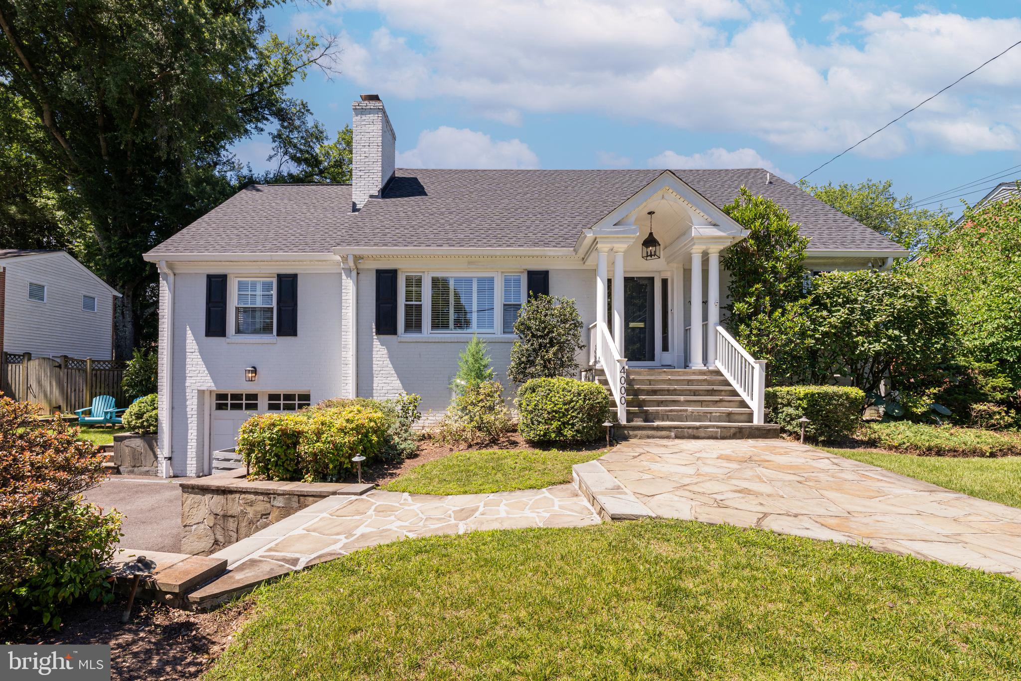 Welcome to 4000 N Upland St., a charming 4 Bedroom, 4 Full Bathroom, and 2 Half Bathroom Cape Cod nestled in the highly sought-after Golf Club Manor neighborhood, just one stoplight from Washington, D.C.  Set on a beautiful .24-acre lot and featuring just over 3,700 square feet, this home offers the perfect blend of classic design and modern updates. The main level enjoys abundant natural light and hardwood floors.  The welcoming Kitchen features ceiling height wood cabinetry, center island, stainless steel appliances, granite counters, a built-in dining banquet, and direct access to the backyard for outdoor grilling, playtime, or relaxation.  A separate Dining Room and Living Room with gas Fireplace as well as a cozy Sunroom provide multiple living area options.  This level conveniently features a Bedroom Suite with an updated Full Bathroom and an additional Bedroom that could double as a private office.  A Powder Room completes the main level. Upstairs is the spacious and inviting Primary Bedroom Suite with a beautifully appointed Bathroom, 2 walk-in closets, an ensuite Study/Office/Sitting Room, and access to attic storage.  An additional Bedroom and Bathroom completes the upper level.  The Lower Level enjoys full size windows and a gas Fireplace in the Family Room as well as a recently finished Rec Room space ideal for a home office, craft room, or organized storage.  An additional Full Bath and Half Bathroom, plus an oversized Laundry Room with walkup access to the backyard make the lower level highly functional and inviting.   Step outside to your private, fully fenced backyard—an expansive, flat green space with beautiful planting beds and a spacious flagstone patio ideal for entertaining, playing, or simply unwinding in a serene setting. A shed can house gardening tools or other outdoor equipment, and a gas grill hook-up makes grilling on demand a breeze.  1-car garage and driveway parking for at least 2 other cars. Beyond the home, enjoy the unparalleled convenience of living near top-rated public schools, best-in-class Arlington parks and hiking trails, National Airport, and easy access to multiple Fortune 500 headquarters. This home is truly a rare find, combining a prime location with delightful living spaces. Make it yours and experience the best of Arlington living!