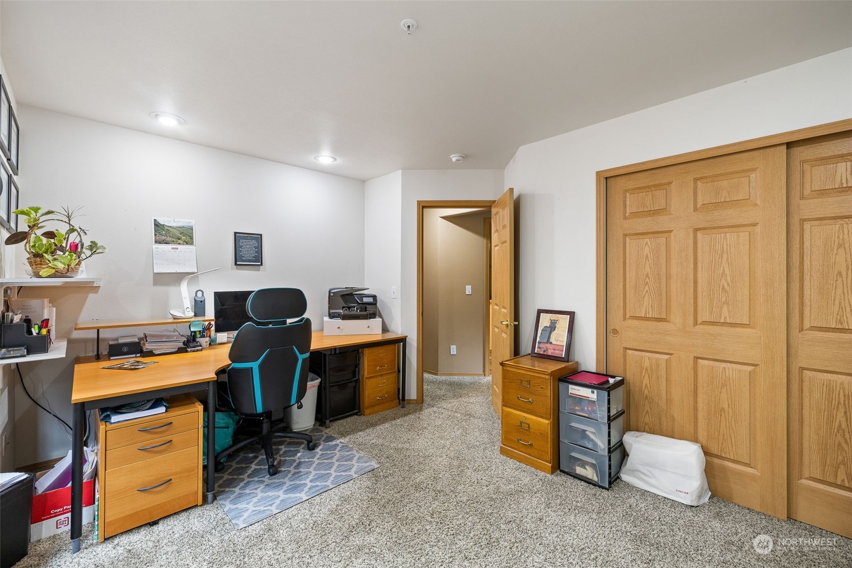 #rd Bedroom being used as a home office. Tons of storage with built in cabinet.