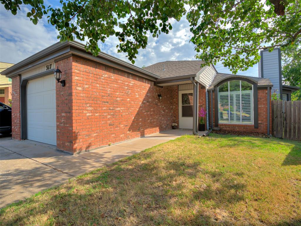 Light-filled, cozy, and perfectly maintained, this adorable West Norman half duplex is ready to welcome its new owner home, all for $165K! From the moment you step inside, soaring vaulted ceilings in the living room and kitchen create an airy, open feel, while laminate wood flooring, plantation shutters, and a wood-burning fireplace bring warmth and character to the space.The kitchen feels fresh and inviting with newly painted cabinetry, new hardware, and updated lighting throughout. Open to the kitchen, the dining area is finished with a dimmable chandelier, creating the perfect spot for cozy dinners at home.The spacious primary suite offers a walk-in closet and beautifully renovated en-suite bath, complete with new tile, a new tub, updated flooring, fresh paint, and freshly painted cabinetry. And just when you think it couldn’t get better, step into a light-filled sunroom tucked right off the primary suite, an unexpected bonus space perfect for relaxing or a home gym plus direct access to the deck for an easy transition to outdoor living.The generously sized guest bedroom is complemented by a renovated bath featuring new tile, fresh paint, and a deep soaker tub perfect for unwinding at the end of the day.Major updates offer added peace of mind with a new Rheem HVAC, roof, and siding all completed in 2022, along with a new garage door opener. The refrigerator, washer, dryer, and alarm system will also remain with the home.Nestled in a quiet West Norman neighborhood while still close to all the shopping, dining, entertainment, and conveniences Norman has to offer, this sweet home is move-in ready, full of charm, and just waiting for its next owner to make it their own. See attached features page for a full list of updates.