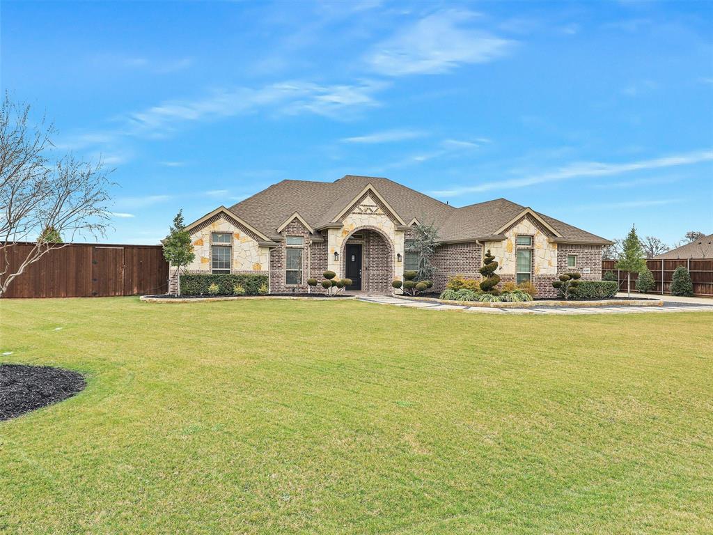 6309 Starr Drive, McKinney, TX 75071No neighbors behind!Welcome to your private retreat on 1.181 acres in McKinney ISD with an incredibly low 1.33% tax rate.This beautifully maintained property offers the perfect blend of thoughtful upgrades, functional improvements, and outdoor living designed for the Texas lifestyle.The recently painted interior feels fresh and inviting, complemented by updated light fixtures, enhanced bathroom mirrors, and ceiling fans in the bedrooms for added comfort and efficiency.Outside, the curb appeal truly shines. Professionally designed natural stone flower beds elevate the front elevation, while established landscaping creates both beauty and natural privacy. A modern sidewalk adds character and functionality, and upgraded exterior lighting enhances the home’s evening presence.The extended driveway provides generous parking, and gutters along with improved drainage systems in the front and side areas ensure proper water management year-round.Step into the spacious backyard designed for both relaxation and entertaining. Enjoy evenings under the covered patio featuring a warm wood ceiling, or tend to your dedicated vegetable garden area complete with its own irrigation system. Additional irrigation supports trees and key landscape areas, promoting long-term health and balance through every Texas season.This is more than a home — it’s a thoughtfully upgraded property with space to breathe, grow, and entertain.