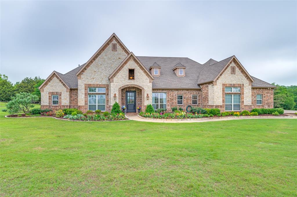 Luxury country oasis situated on 24 sprawling acres in Celina with stunning custom built home featuring gated entry, 4 bedrooms, 3 full baths, 1 half bath, 2 living areas, study, mudroom, sparkling pool w spa, fenced pasture and a barn.  Spectacular curb appeal with gated drive, lush landscape, brick and stone elevation surrounded by mature trees and fully gated.   Exquisite home throughout with designer features including  custom trim, expanded base, rich wood flooring, decorative lighting, built-ins, custom cabinetry, plantation shutters and more. Family room boast floor to ceiling stone fireplace, built-in, wood beamed ceilings & stunning views. Exquisite chef's kitchen with built-in Stainless Steel refrigerator, commercial grade Wolf gas cooktop with 6 burners and griddle, double ovens, large island with farm sink breakfast bar with seating for 5. Private master suite w sitting area, stunning tray ceiling, walk-in closet, free  standing tub large walk-in seamless glass shower, & H+H split vanities.  Special features include outdoor living space with fireplace, full kitchen overlooking the sparkling pool with spa, and mature treeline. Spectacular barn with horse stalls, sitting area and an upstairs area that is perfect for entertaining or additional storage.  Enjoy the tranquility of the country with breathtaking sunsets and being just minutes to shopping, dining and entertainment. Reference MLS 20938995 and 20939066