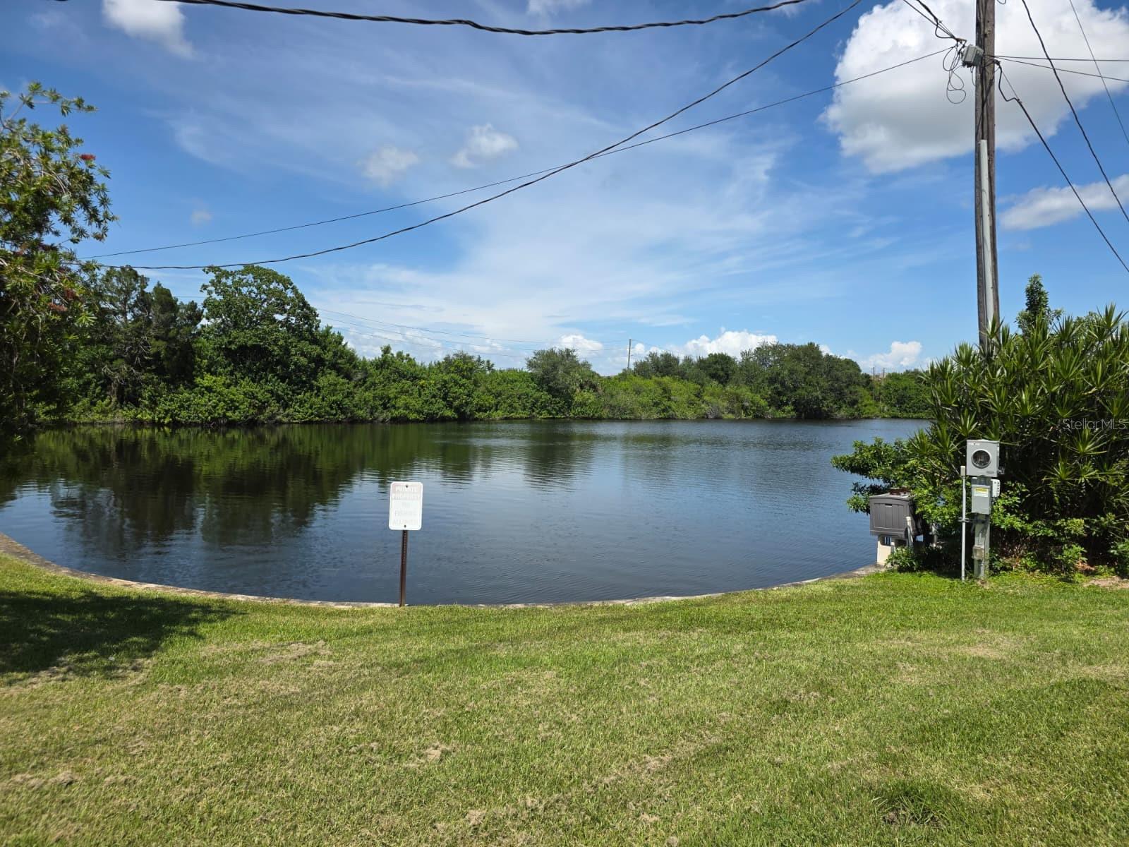 Located in the friendly 55+ community of The Mainlands Unit Three, this two bedroom masonry home enjoys a tranquil pond setting and a peaceful Florida lifestyle. Tile flooring runs throughout the home, while the spacious open kitchen and dining area provide a comfortable gathering space. Central heat and air add year round comfort, and the versatile Florida room can be enjoyed screened or enclosed depending on the season, with serene water views.A brand new tile roof was installed in 2025. The home does have some deferred maintenance related to a previous roof leak, offering an opportunity for a new owner to bring their vision and some TLC to this well located property. The home is being sold furnished for the convenience of the owners.Residents of The Mainlands Unit Three enjoy a welcoming, active community with an impressive array of amenities and social activities. The private recreation area features a clubhouse with meeting rooms, a stage, full kitchen and library, while outdoors you’ll find a large swimming pool, shuffleboard courts and outdoor cooking areas. The Unit Three Social Club keeps the community lively with a full calendar of events, including breakfasts, dances, bingo and more.The $490 monthly maintenance fee provides truly maintenance free living and includes water, sewer, trash, cable, internet, lawn care, reclaimed water irrigation, exterior painting and pressure washing, plus roof repair and maintenance. Golf carts are welcome, and residents may have up to two domestic pets.Ideally located just off US 19, The Mainlands offers convenient access to shopping, dining, downtown St. Petersburg, Tampa and the beautiful Gulf beaches. Whether you’re looking for a full time residence or a seasonal Florida retreat, The Mainlands offers an exceptional combination of convenience, community and carefree Florida living.All measurements are approximate and should be verified by the Buyer.