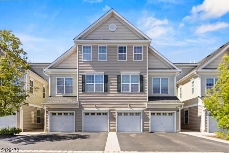 Welcome to this beautifully appointed townhome, offering the perfect blend of style and convenience, an exceptional opportunity for today's buyer. A grand foyer entry welcomes you into a bright, open-concept layout filled with natural light. The living and dining areas showcase hardwood flooring, recessed lighting, and a cozy gas fireplace, ideal for both everyday living and entertaining. The well-designed kitchen features stainless steel appliances, a breakfast bar, and a pantry. This home offers 2 bedrooms and 3 full bathrooms, including a full bath on the main level. The primary suite features an en- suite bathroom with a jetted soaking tub and separate shower. A 2nd floor laundry room adds everyday ease and practicality. A functional mudroom provides easy access from the attached one-car garage, which is equipped with an electric vehicle charging station. Additional highlights include a private-width driveway, smart thermostat, and smart lighting for modern, energy-efficient living. An open banister overlooks the living and kitchen areas below, enhancing the home's airy and sophisticated feel. Perfectly located for commuters, this home is within walking distance to the Bound Brook Train Station and offers easy access to Routes 287 and 22. Just minutes from Rutgers University, Robert Wood Johnson University Hospital, and St. Peter's University Hospital, the location is unbeatable. Don't miss this opportunity to own a stylish, move-in-ready home in a prime location!