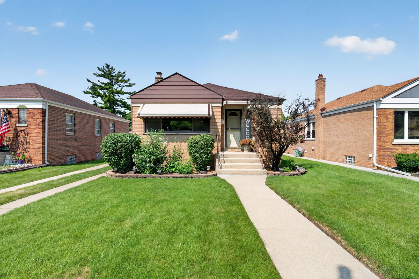 Welcome home to this well-maintained 3-bedroom, 1-bath home offering plenty of living and storage space. Hardwood floors run throughout the main level, while the kitchen features tile flooring, granite countertops, and a new microwave. The full finished basement offers additional living space, a dedicated workshop, a laundry/storage room, and convenient walk-up exterior access. A concrete crawl space provides an impressive 16x20 storage area beneath the home. Outside, enjoy the fully fenced backyard, detached 2-car garage, and side driveway, providing plenty of space for parking, pets, entertaining, or relaxing. Major updates include the roof, siding, and windows (2017), furnace and A/C (2018), water heater (2020), and fence (2022).