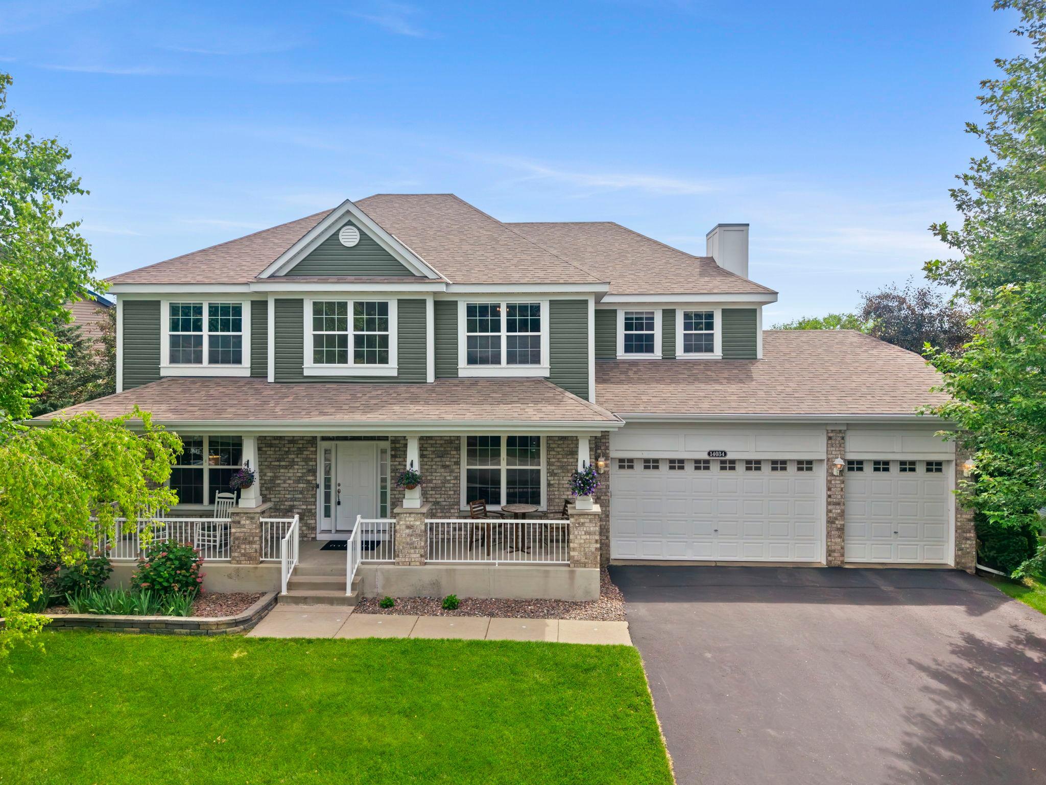 Stunning, spacious, and truly one of a kind, this exceptional 5-bedroom, 5-bathroom home offers over-the-top living, custom craftsmanship, and an incredible setting backing to wetlands and a pond with no rear neighbors.Ideally located near Rogers Middle and High School, neighborhood parks, trails, and everyday conveniences, the home combines privacy with accessibility.Inside, every space has been thoughtfully designed for comfort, functionality, and entertaining. Refinished Brazilian hardwood floors, custom wainscoting, oversized windows, and abundant natural light create a warm yet impressive atmosphere.The main level features multiple gathering spaces, a private office, formal and informal dining, and a beautifully customized kitchen with exceptional storage, organization, and a large center island. Upstairs, the private primary suite offers a spa-like bath, dual walk-in closets, and an adjoining flex room with a fireplace, while three additional bedrooms and a versatile den provide outstanding flexibility.The walkout lower level is an entertainer's dream, complete with a spacious family room, spectacular custom wet bar, dedicated theater room, finished exercise room, guest suite, and abundant storage. Outside, enjoy peaceful views from the expansive deck, patio, and beautifully landscaped yard with raised garden beds and a storage shed.Extensive recent updates include a new roof, siding, furnace, refinished hardwood floors, carpet, interior paint, lighting, custom built-ins, and more, making this remarkable home as move-in ready as it is unforgettable.