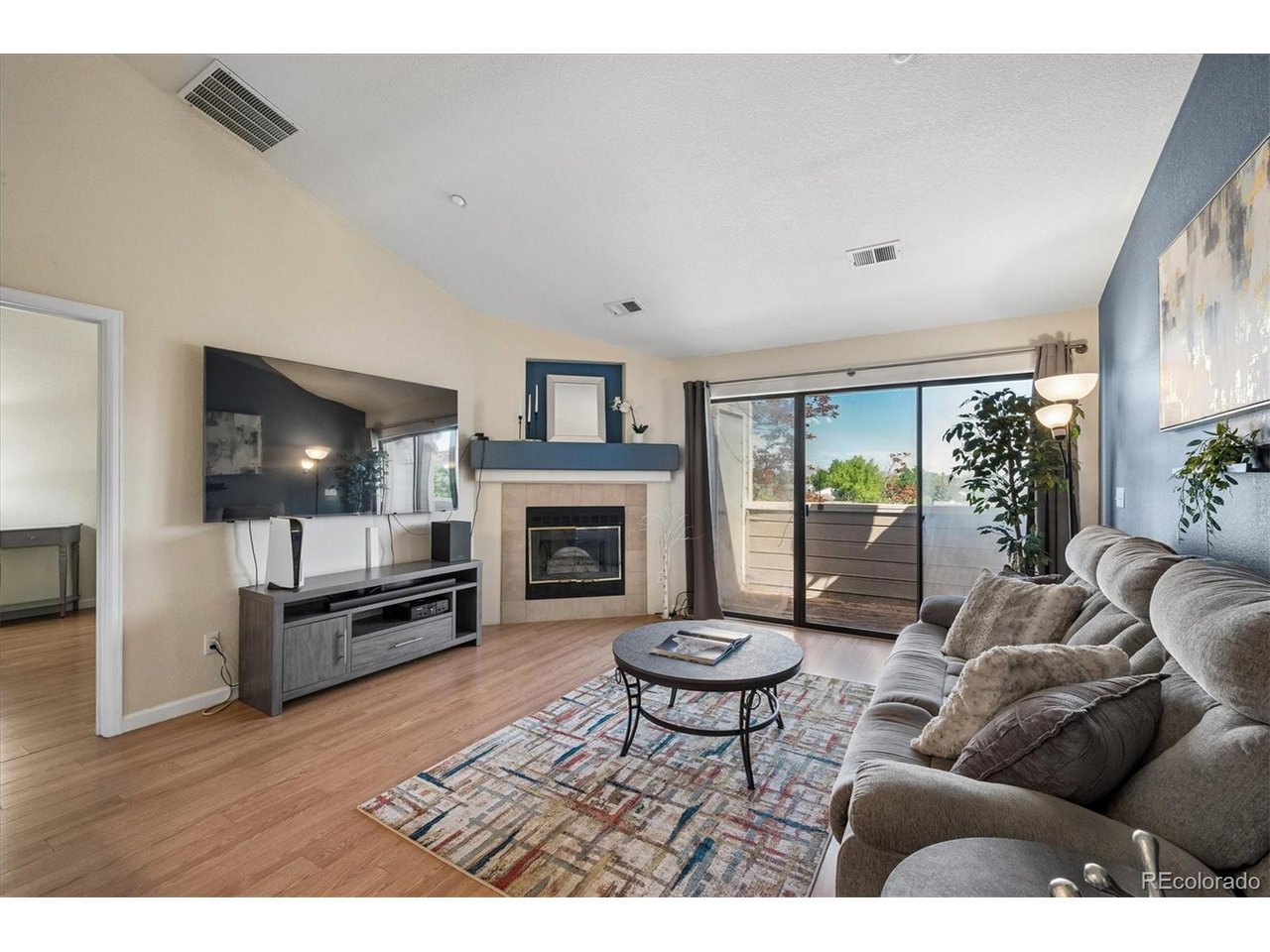 Welcome to this charming home, located in the very popular community of Mountain Gate in Ken Caryl Ranch.  Situated on the top floor, you'll enjoy the vaulted ceilings and tons of light, with the Great Room, Kitchen, and Dining area all in an open deisgn, perfect for everyday living or entertaining.  The Primary bedroom is spacious, with large walk-in closet and En suite full bath, and the second bedroom is perfect for either a bedroom, home office, or second media area.  Enjoy a morning cup of coffee or an evening dinner and sunset on the balcony, with a peak at our beautiful mountains.  Every day convenience is offered with in-unit laundry, so no hauling your laundry down to a dark basement!  Enjoy walking on the many trials in Ken Caryl, as well as the amazing community of Ken Caryl's amenities including tennis, clubhouse, and pool.  Conveniently located by C-470 for easy commutes to downtown, DTC, or to a mountain adventure!  Welcome Home!
