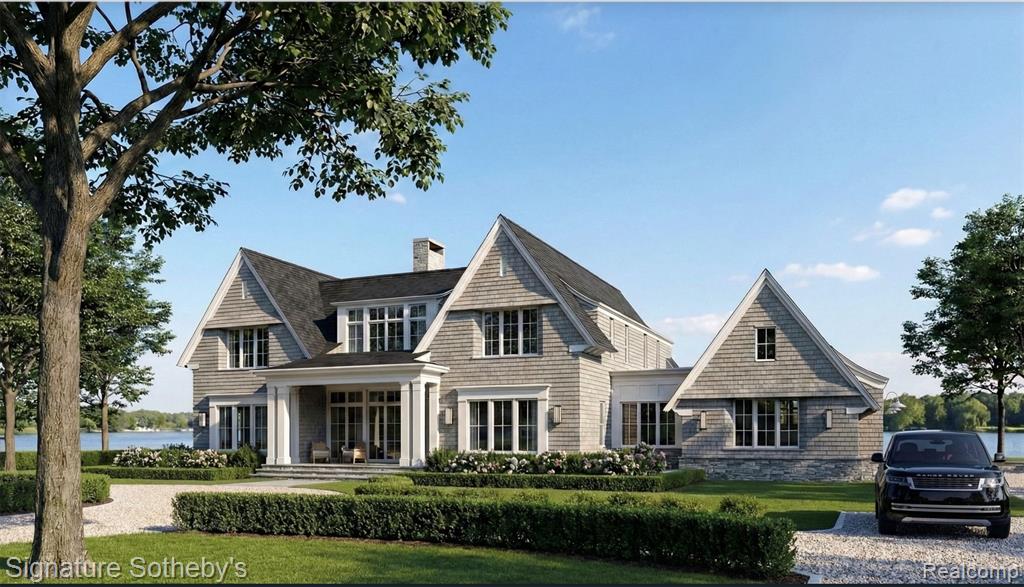 Crafted by La Marco Homes and thoughtfully designed by Krieger Klatt Architects, this to-be-built lakefront residence offers 5,473 square feet of refined living space with 4 bedrooms, 4.2 bathrooms, and approximately 100 feet of private frontage on the serene waters of Lake Angelus. The exterior is defined by steep gabled rooflines, cedar shake siding, and divided-light windows, brought together with a clean, symmetrical composition and large windows that fill the home with natural light and uninterrupted views of the water. The open-concept floor plan is designed for seamless lakefront living. A foyer opens directly onto panoramic views and draws you towards a great room, the dining area and a chef’s kitchen equipped for both everyday function and elevated entertaining. A large butler’s pantry adds valuable prep and storage space, while the adjacent mudroom provides ample space for busy households. The first-floor primary suite is carefully positioned for privacy and views, featuring a spacious built-out closet and a spa-like ensuite bath. Upstairs, three additional bedrooms—each with its own ensuite bathroom—are complemented by a second-floor laundry and a large flex room with a private balcony. The three-car attached garage offers convenience and additional storage. Outside, a private patio overlooking Lake Angelus provides a stunning setting for outdoor dining, lakeside lounging, or simply taking in the tranquil water views in one of the region’s most exclusive locations. This is a rare opportunity to own a new custom home on Lake Angelus — a private, all-sports lake known for its peaceful setting, low boat traffic, and grand estates.