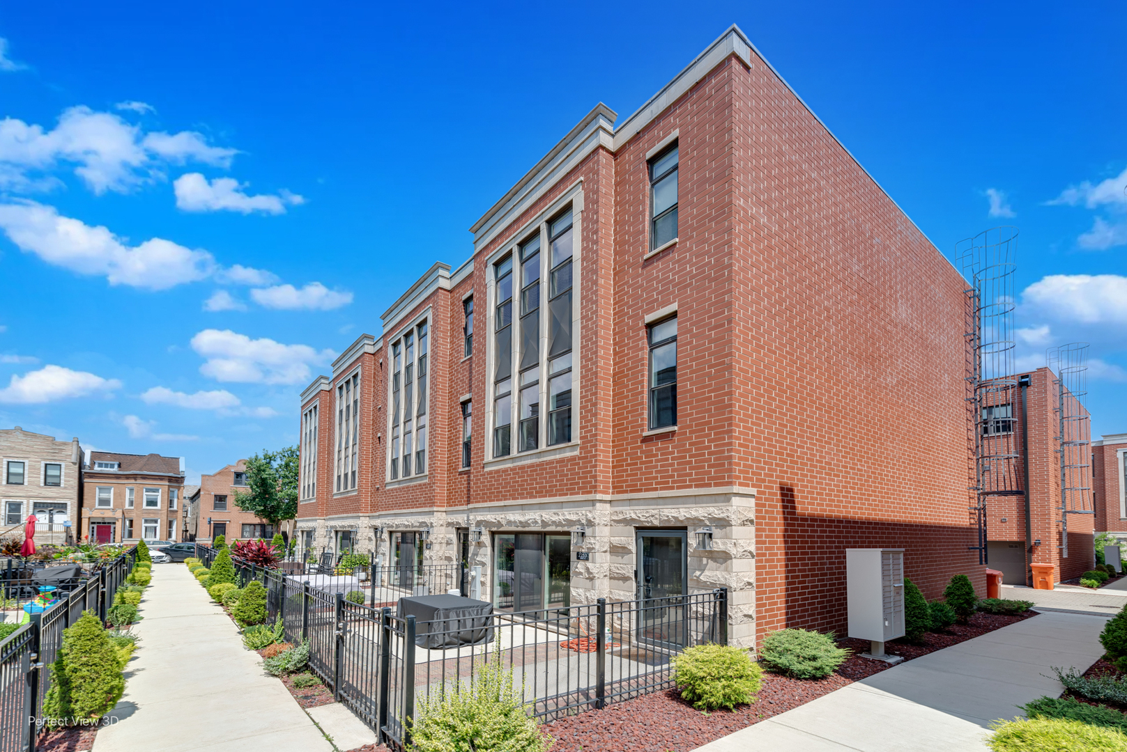 Step into modern elegance with this like-new 3-bedroom, 2.5-bath townhome featuring an attached 2-car garage, EV charging station, and private outdoor spaces. Designed for today's lifestyle, this home blends comfort, style, and convenience in the heart of Chicago.  The spacious main level recreation room flows seamlessly to a private fenced patio (19' x 14')-perfect for summer gatherings or relaxing evenings. The first floor boasts a bright, open-concept layout with floor-to-ceiling natural light, a sleek contemporary kitchen with quartz countertops, custom cabinetry, stainless steel appliances, rich hardwood floors throughout and a living room. A private balcony adds even more outdoor living space. Upstairs, you'll find three generously sized bedrooms offering comfort and retreat, with every detail reflecting high-quality craftsmanship and modern finishes. Located near premier shopping, dining, and transit, this home truly has it all-sophisticated design, modern upgrades, and unbeatable city convenience.