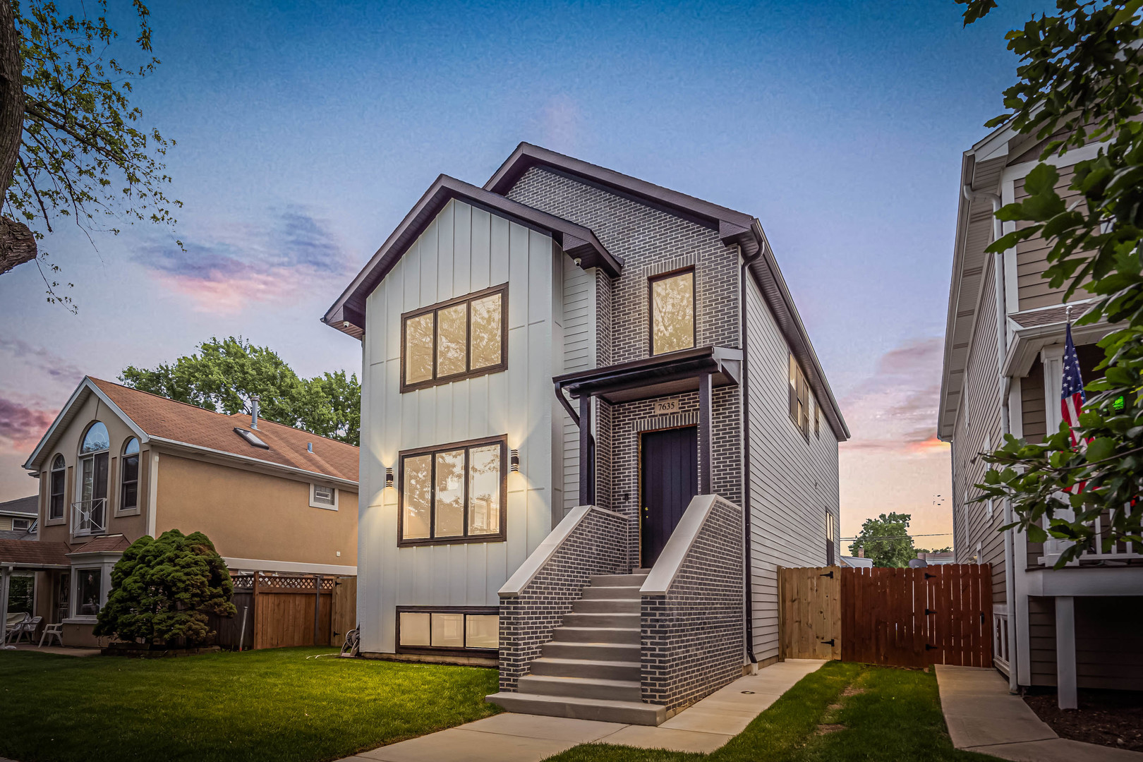 Welcome to the heart of one of Chicago's most vibrant and family-friendly neighborhoods - Oriole Park. This is where community, comfort and craftsmanship come together. Discover this exceptional 5-bedroom, 3.5-bath new construction home, ideally located near Oriole Park on an extra wide lot. This beautiful residence showcases an open-concept layout with bright, airy rooms and high-end finishes throughout. The gourmet kitchen is a chef's paradise, featuring sleek quartz countertops, top-tier stainless-steel appliances, a spacious island, and a cozy eating nook. The main level also includes a modern powder room along with large and welcoming living room and electric LED fireplace. Upstairs, the lavish master suite is a true retreat, complete with expansive walk-in closets and a private ensuite featuring a double-sink vanity and soaking tub. The second floor also includes three additional bedrooms, offering plenty of space for family and guests. The fully finished basement extends the living area with a wet bar, a large recreation room, a fifth bedroom, and another full bath-perfect for entertaining or hosting visitors. Step outside into the green fenced yard with a charming deck, creating a peaceful outdoor oasis for relaxation or activities. The added convenience is a brand new 3-car garage. With its prime location near the train station, shopping, dining, and Oriole Park for scenic walks, this home offers both luxury and convenience. Don't miss the chance to make this stunning new construction your own in one of Chicago's most desirable neighborhoods!
