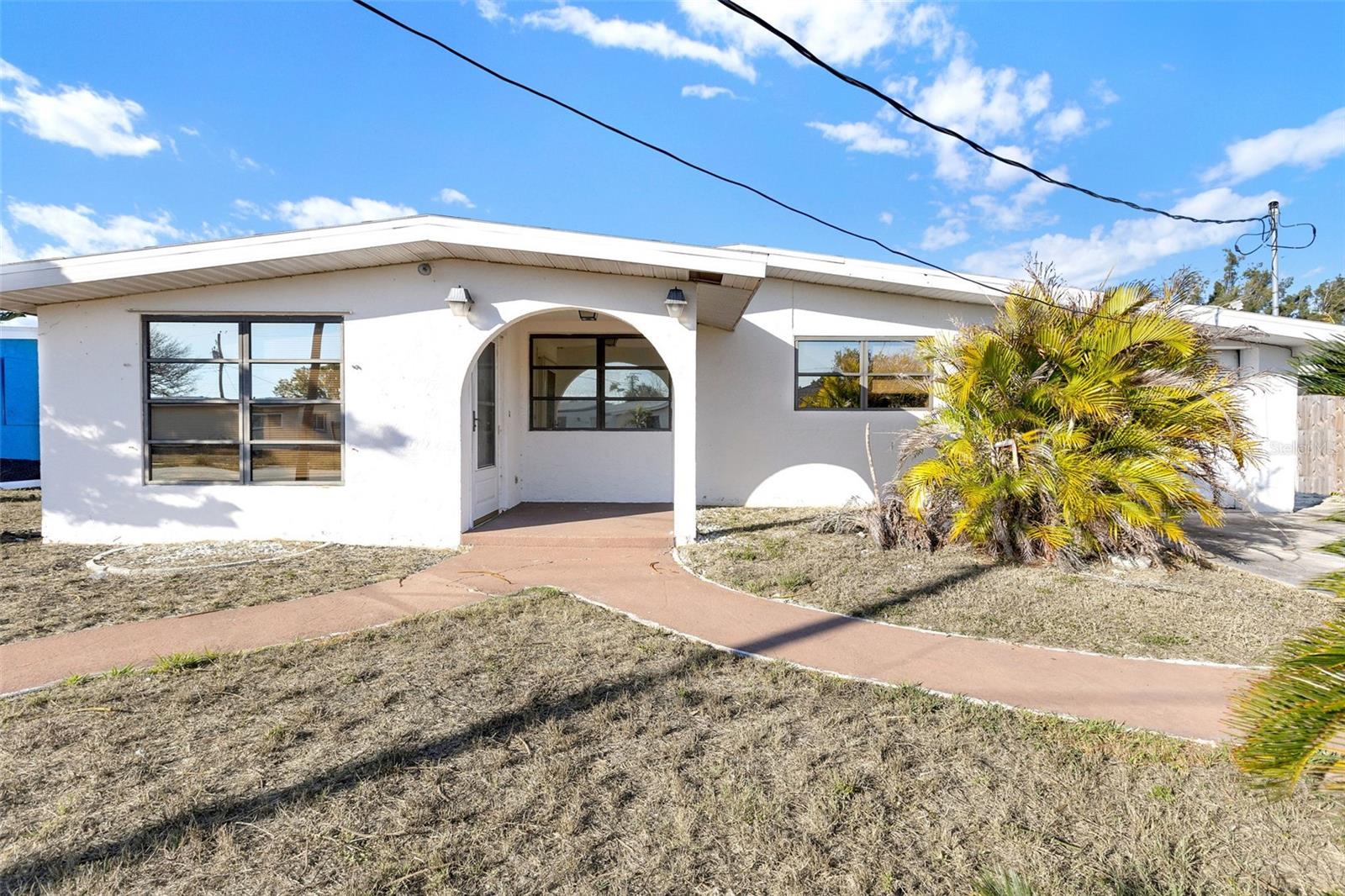 Investor Special with Gulf Access! Don’t miss this incredible opportunity to own a 3-bedroom, 2-bath waterfront property offering 1,899 square feet of living space on a canal with access to Charlotte Harbor and the Gulf. Whether you’re looking for your next flip, seasonal rental, or long-term investment, the location alone makes this one a standout.The home features an open floor plan with spacious living and dining areas, providing a great foundation for renovation or customization. The attached 1-car garage includes a small workshop area—perfect for storage, tools, or hobby space. Step outside to your private backyard oasis with an in-ground pool overlooking the canal, offering the potential to create a true Florida waterfront retreat.With boating access, strong rental potential, and endless possibilities to add value, this property is ready for your vision. Prime location close to shopping, dining, and area amenities while still offering the peaceful waterfront lifestyle buyers seek.Bring your ideas and unlock the potential!