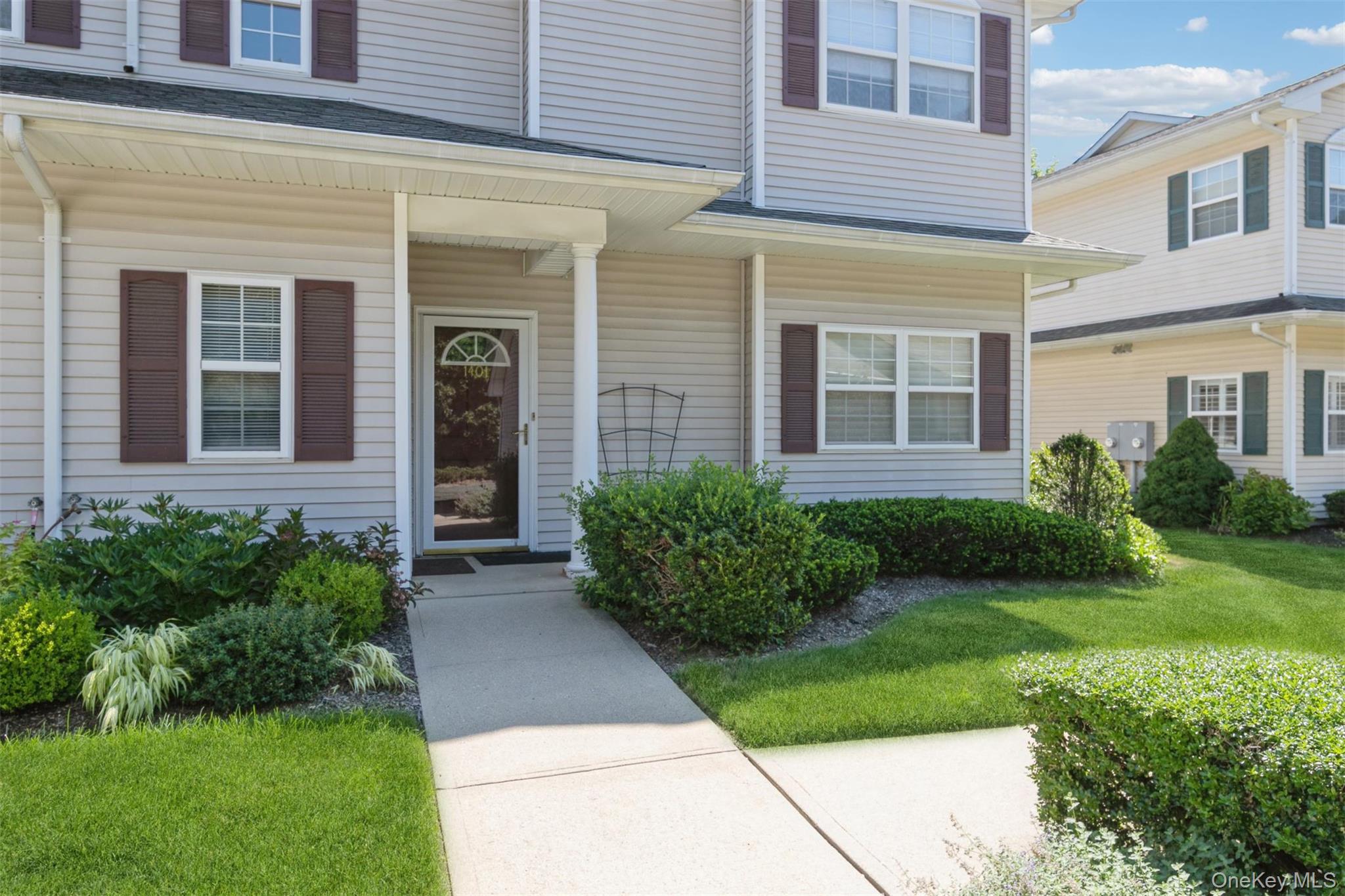 Welcome to Eagles Walk in East Quogue, Town of Southampton 55+ gated community This beautifully maintained first-floor, two-bedroom, two-full-bath condo offers easy, comfortable living in a wonderful community setting. Step inside to find beautiful NEW high-end luxury vinyl flooring, an abundance of natural light creating a bright and inviting atmosphere.The spacious primary bedroom features its own private full bath, while the well-appointed kitchen offers a separate pantry and plenty of storage. Enjoy the convenience of an in unit laundry room, along with tons of additional storage throughout. Step outside to your private patio, perfect for relaxing, entertaining, or enjoying your morning coffee.Additional features include a one-car garage and wonderful community amenities, including a heated saltwater swimming pool and clubhouse, giving you the perfect opportunity to relax, socialize, and enjoy the East End lifestyle.Ideally located in East Quogue, you’re just minutes from the Town of Southampton’s premier beaches, as well as beautiful vineyards, farms, restaurants, shopping, and everything the Hamptons and East End have to offer. Whether you’re looking for a year round residence or the perfect East End getaway, this home truly has it all