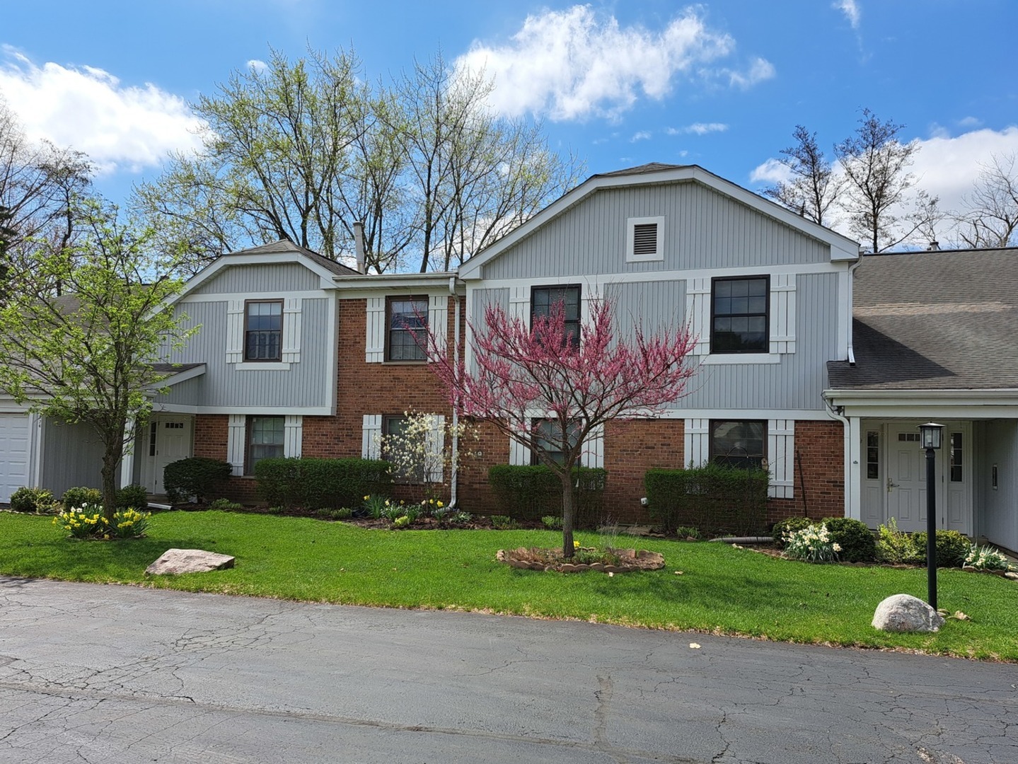 This beautiful first-floor home is move-in ready and located in the desirable Lexington Green community in Schaumburg. It offers 3 bedrooms, 2 full bathrooms, and a spacious open layout with plenty of natural light.  The large living room features sliding doors that lead to a patio and green space. The kitchen is modern and functional, with granite countertops, appliances, ample cabinet space, and a breakfast area. There is also a separate dining space, perfect for entertaining.  The primary bedroom includes a walk-in closet and a private bathroom with a walk-in shower. Two additional bedrooms and another full bathroom provide plenty of space for family or guests. The home also includes an in-unit laundry room and an attached 1-car garage.  Residents enjoy low-maintenance living with access to a pool, clubhouse, and playground. The home is in a highly rated school district and is conveniently located near shopping, restaurants, Woodfield Mall, and major highways.  This is a rare and spacious unit in a great location-don't miss it!