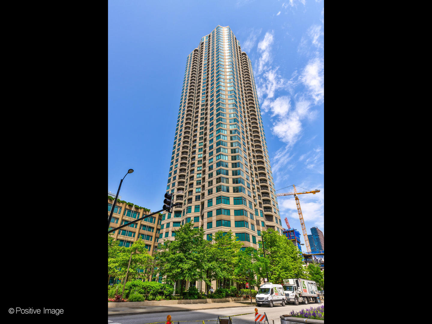 Experience vibrant River North living in this spacious 1-bedroom, 1-bath corner condo at 400 N LaSalle. This home features floor-to-ceiling windows with northwest exposure that fill the space with natural light and showcase panoramic city views from the private balcony. The open layout flows from the entry foyer into the kitchen, dining, and living areas, creating an inviting space for both everyday living and entertaining. The oversized bedroom easily accommodates a king bed and features a generous walk-in closet, while the in-unit W/D and additional storage provide everyday convenience. Residents enjoy resort-style amenities including a newly renovated fitness center, outdoor pool with sundeck, grilling stations, pergolas, fire pit, and lush landscaping. Additional features include a social room with TV and games, 24-hour door staff, on-site maintenance, attended dry cleaning and package receiving, secured bike storage, and a dedicated dog relief area. Steps from the Riverwalk, East Bank Club, public transit, and many of the city's best restaurants, this prime River North location puts the best of Chicago right at your doorstep.