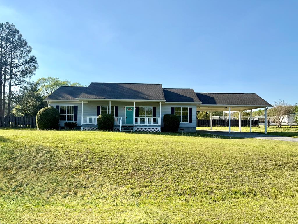 Four-bedroom, two-bath home conveniently located right off Dillon Road in a quiet neighborhood. Attached two-car carport, covered porch, and spacious deck in the rear of the home for entertaining. Fully-applianced spacious galley-style kitchen, walk-in laundry , and large master suite. Well priced for a quick sale.  Call today.