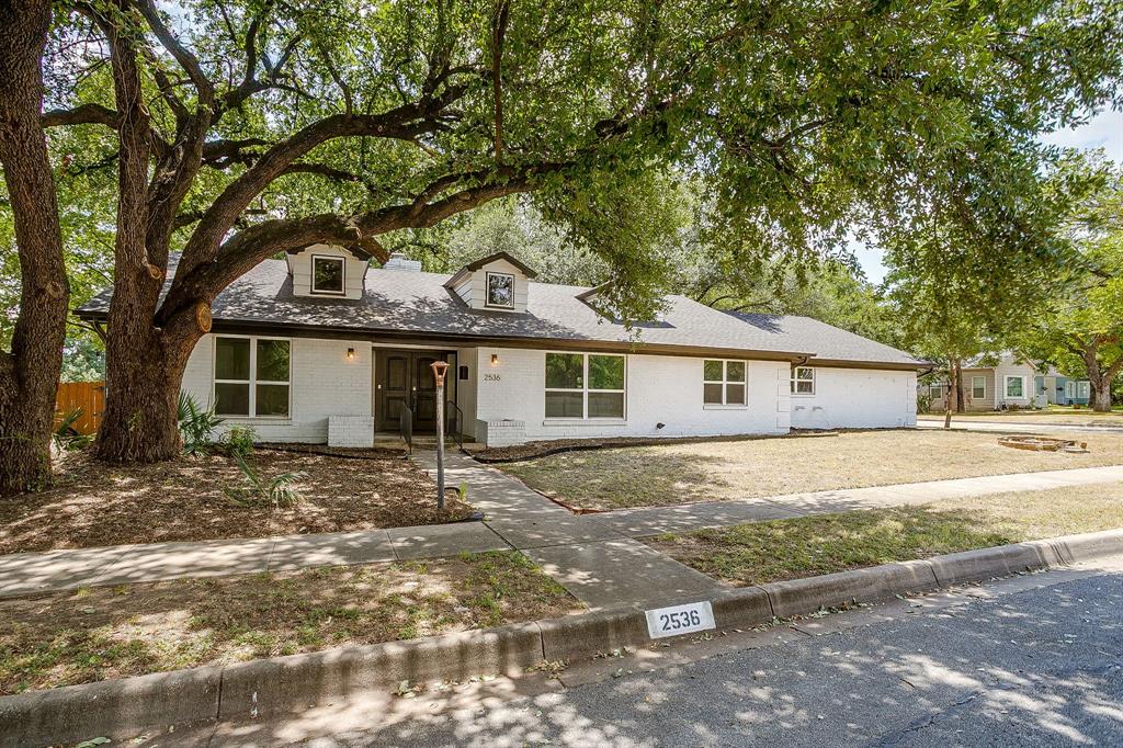 Just steps from Oakhurst Park, this fully renovated 4-bedroom, 2.5-bath home delivers modern style, peace of mind, and unbeatable convenience. Every inch of the interior was completely updated in 2022—including all new flooring, doors, cabinets, kitchen, baths, and hardware—creating a fresh, turnkey living experience. Major system upgrades were also completed in 2022, including a brand-new AC, roof, garage door, windows, and fence. The spacious, light-filled layout offers both comfort and flexibility, while the private backyard is perfect for relaxing or entertaining. Ideally located near shopping, dining, and Fort Worth attractions, this home blends neighborhood charm with city accessibility.