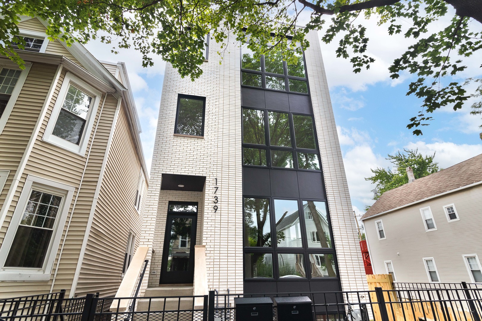 Stunning new construction 3 bed/3.1 bath duplex up with fantastic indoor and outdoor space! Expertly crafted two unit building by top Chicago developer. Second floor duplex up with open concept main-level living area, upper-level sleeping quarters, and huge covered deck with outdoor fireplace. Sun filled living/dining area with oversized front windows. Combined kitchen/family room perfect for entertaining. Eat-in kitchen features modern flat panel cabinetry, quartz countertops, island, butler pantry with sink and beverage center, pantry closet, and Bosch appliance package. Adjoining family room with patio doors to covered deck with outdoor fireplace. Upper-level primary suite with luxury bath featuring heated flooring, dual vanity, and a frameless glass shower + WIC. Two additional bedrooms, each featuring ensuite bath with tub, laundry with washer/dryer, and mechanicals complete the unit. Detached garage with one space per unit + option for roof deck. Awesome location in Logan/Humboldt close restaurants, shopping, groceries, the 606 trail, 200-acre Humboldt Park, other great neighborhoods, and much more!