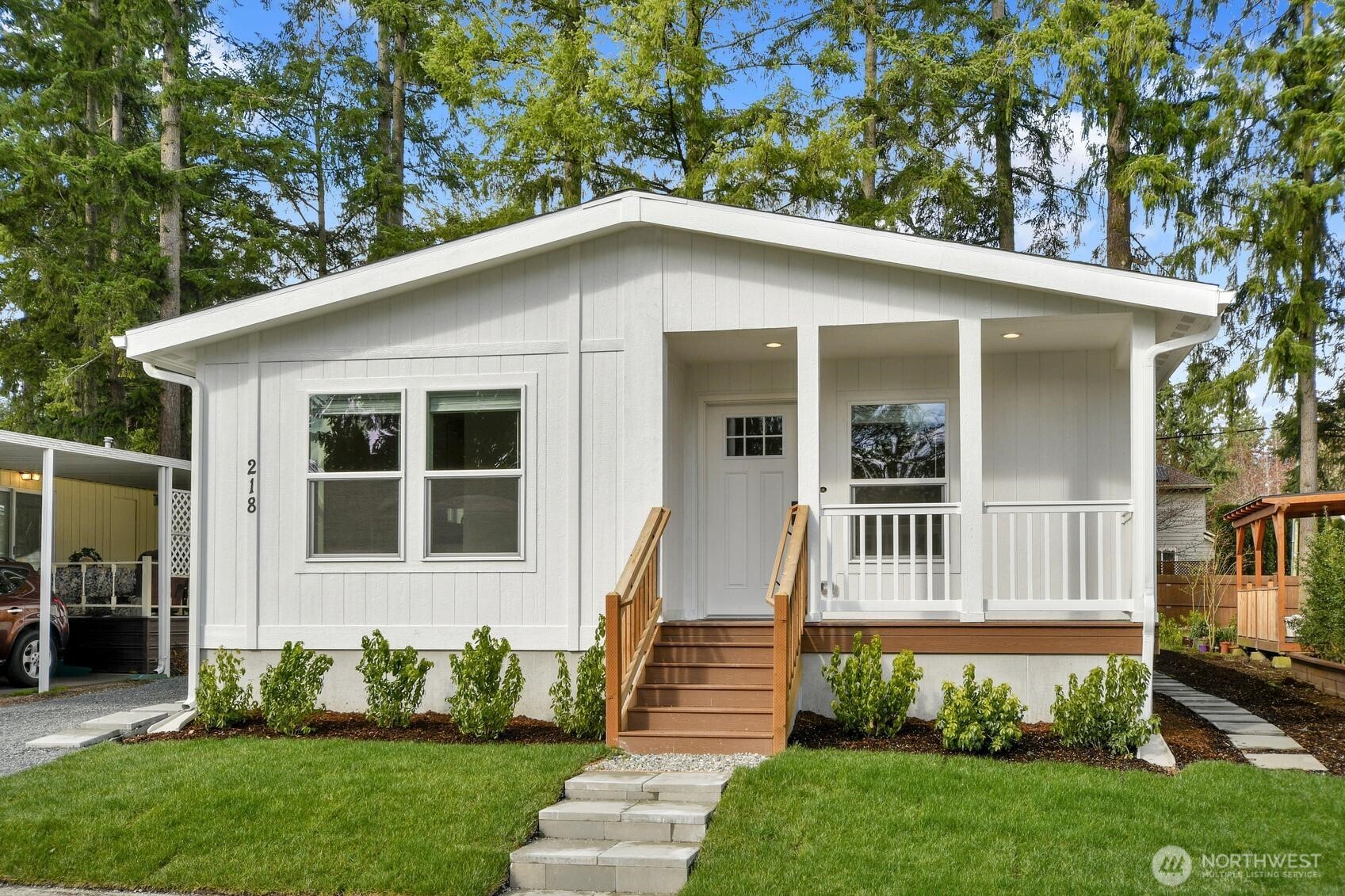 Your new home awaits! Brand new Heritage Home in the desirable 55+ Friendly Village community in Redmond. This  beautifully designed 3-bedroom, 2-bath offers comfortable, modern living with stylish finishes throughout. The kitchen  features elegant soapstone countertops, Island bar, all stainless steel appliances, and plenty of space for cooking and  entertaining. Outdoor storage shed for additional storage. Carport installed prior to closing. The open and inviting layout provides comfortable living spaces and a wonderful place to relax or host guests. Friendly Village residents enjoy fantastic community amenities including a heated swimming pool, clubhouse, exercise equipment, recreation room with pool table and ping pong, library, and a fenced dog  area for your four-legged companions. Ideally located near shopping, dining, parks, and everyday conveniences.  Experience easy, vibrant living in one of Redmond’s most welcoming 55+ communities!