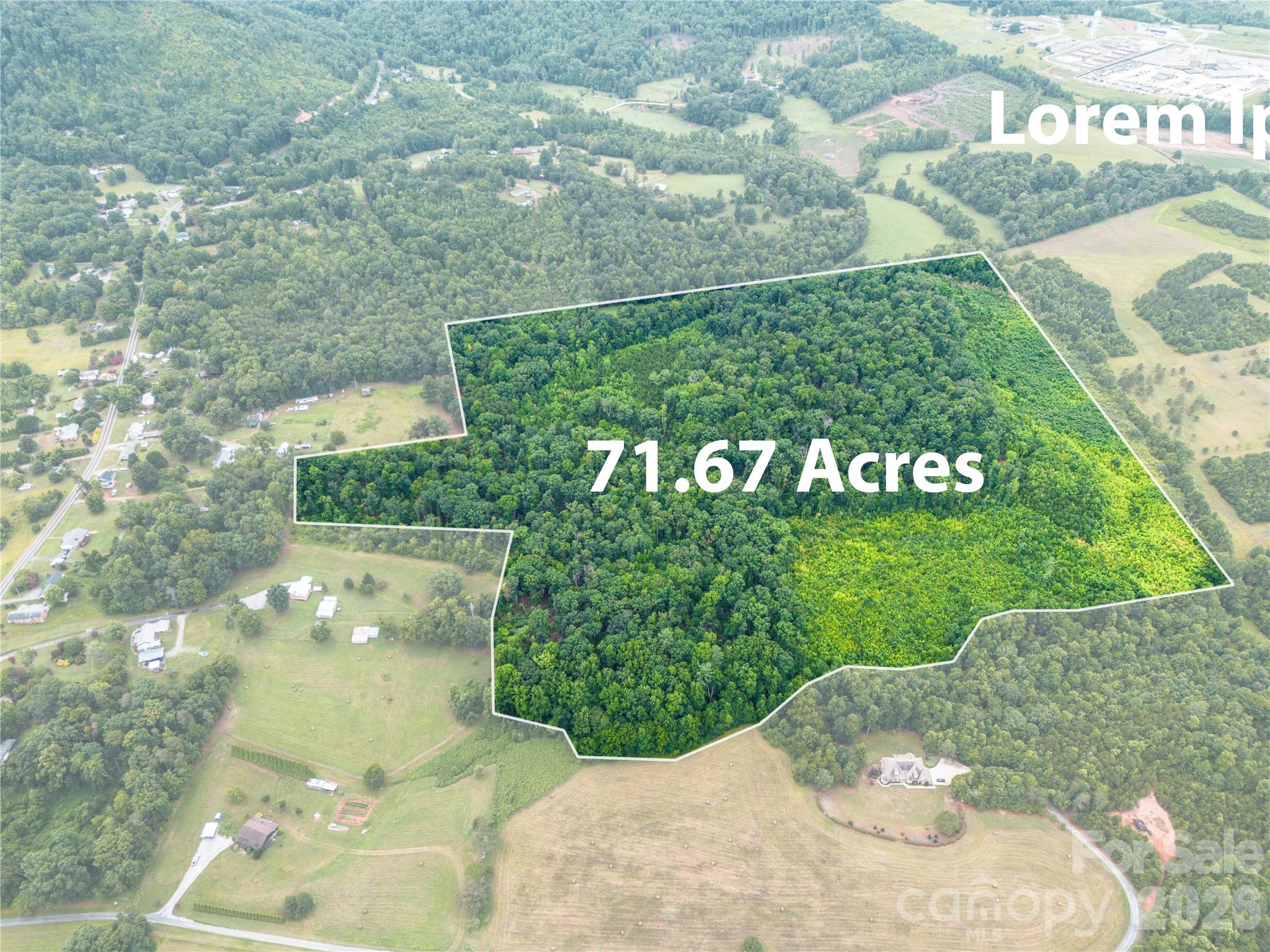 Discover the possibilities with this 71.67-acre wooded tract located off Enola Road in Morganton. This spacious property offers natural privacy, mature trees, and a peaceful setting with room to explore a variety of potential uses. Whether you are looking for recreational land, a private homesite, timber potential, or a long-term investment opportunity, this acreage provides a great canvas. Conveniently located with access to Morganton amenities while still offering a quiet rural feel.