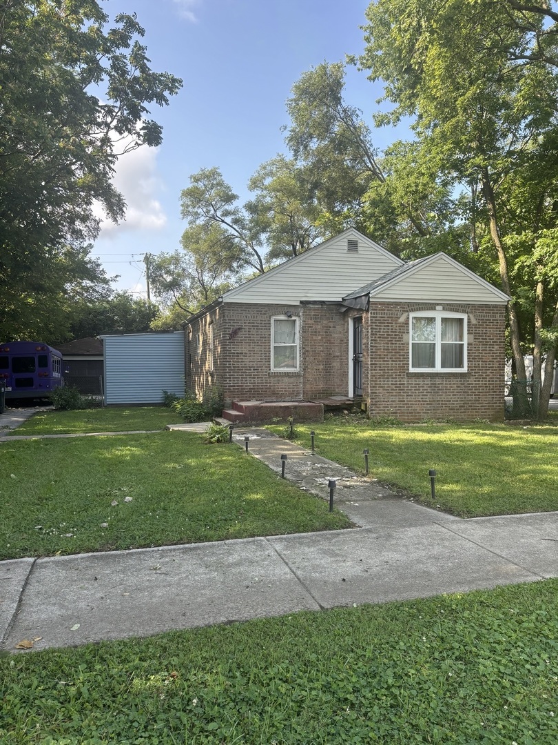 Come view Robbins home and all its POTENTIAL. Home needs to be rehabbed, # bedroom 1 bath 2 car garage and huge CORNER LOT to enjoy the summer cookouts. Large driveway that extends to back of the yard. Do not pass this opportunity to come in and rehab this home.