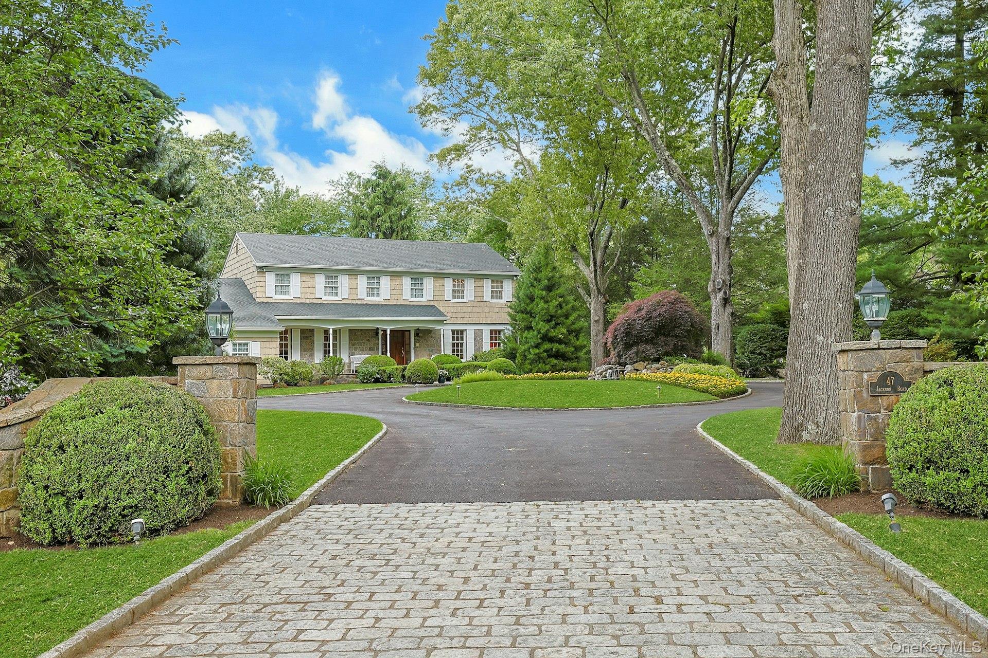 Set on a quiet cul-de-sac in the highly sought-after Byram Hills School District, this meticulously maintained 4-bedroom, 3.5-bath Center Hall Colonial on two beautifully manicured acres offers exceptional privacy paired with everyday convenience. A sweeping circular driveway creates a striking first impression and welcomes you to this exceptional property.Designed for both comfortable everyday living and entertaining, the home features a bright eat-in kitchen at the center of it all, spacious formal and casual living areas, and a gracious dining room perfect for holidays and gatherings. Large windows fill the home with natural light and overlook the peaceful property, while the expansive back deck is the perfect place for morning coffee, summer dinners, or simply taking in the surroundings. Upstairs, four generously proportioned bedrooms include a spacious primary suite complete with a large walk-in closet and ensuite bath. The lower level offers incredible flexibility with a full bath, wine cellar, workshop, and abundant storage. Ideally located just minutes from the towns of Armonk, Bedford, and Greenwich, and less than an hour from Manhattan - all with low taxes.