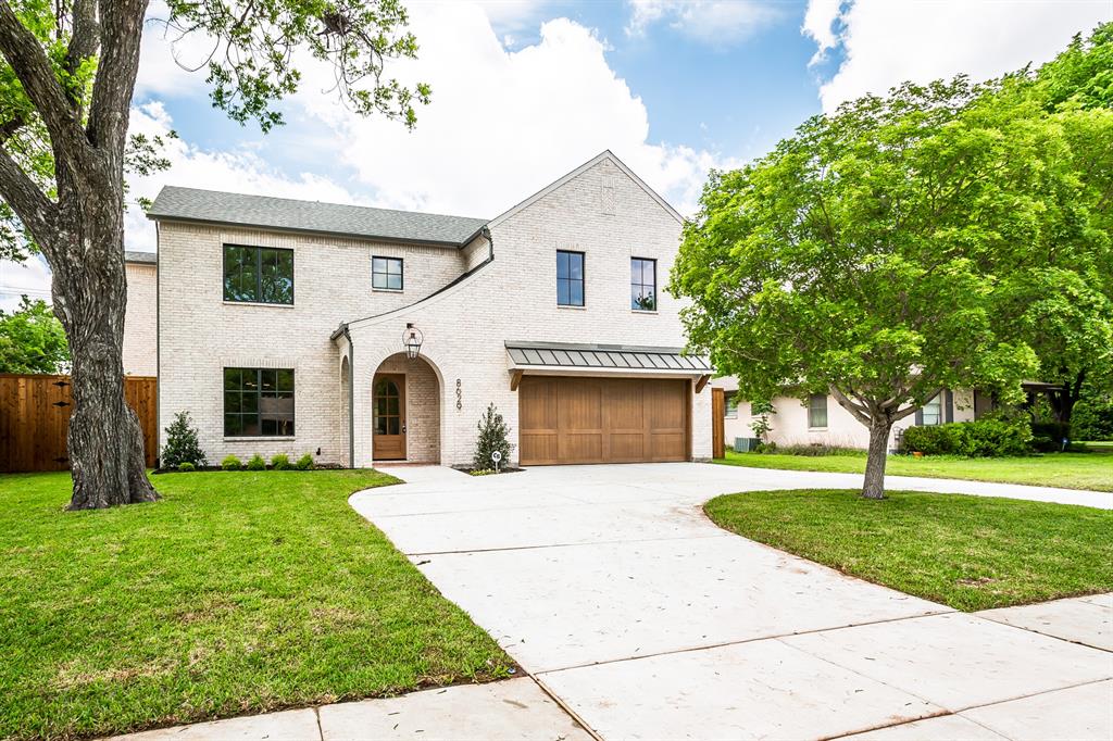 Located in highly sought-after Lake Highlands neighborhood, 8629 Lockhaven presents a rare opportunity to live in one of the city’s most desirable areas. Zoned to the acclaimed Lake Highlands Elementary and minutes from White Rock Lake, residents enjoy access to scenic walking and biking trails. The home is conveniently close to top-rated schools, dining, and entertainment—offering the perfect balance of location and lifestyle.This stunning 4,110-square-foot home seamlessly blends modern design with everyday functionality. Arriving on its circular driveway, the beautifully crafted exterior is stunning.  Inside, an expansive open-concept layout filled with natural light from Pella windows, while custom ceiling arches elevate the main living space along with 12' ceilings. A marble-surround gas fireplace anchors the room, creating a warm and inviting focal point. A private first-floor study with glass doors provides a perfect work-from-home space, while the downstairs primary suite serves as a true retreat, featuring a high vaulted ceiling, freestanding soaking tub and elegant marble finishes throughout.At the heart of the home, the chef’s kitchen impresses with luxurious marble countertops, a full-height stone backsplash, top-of-the-line KitchenAid appliances, and a dedicated prep area with a spacious walk-in pantry. Sliding glass doors seamlessly connect the living and kitchen areas to an outdoor grilling space, creating effortless indoor-outdoor living. The expansive backyard is equipped with a multi-zoned sprinkler system for easy maintenance.Upstairs, a custom-designed game room features built-in entertainment cabinetry and a bar area, perfect for hosting. Three additional bedrooms complete the second level, each paired with bathrooms showcasing designer tile and high-end finishes.With high end lighting, premium appliances, and thoughtfully curated designer touches throughout, this home offers a rare combination of elegance, comfort, and versatility.