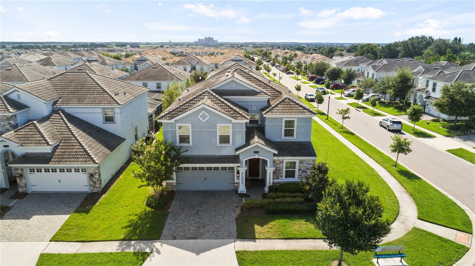 SELLER SAYS SELL!. This is an 8 bedroom with 5 bathrooms fully furnished pool and spa home with an extended pool deck. This home is excellent for short term rental.(Bookings can convey) Large open Kitchen with Granite Counter Tops, Stainless Steel Appliances. Two bedrooms on the first floor, one is the main master and the other is a bedroom with a connect bathroom. Main living area in on the first floor. All appliances come with the home including the washer and dryer (property has connection for two dryers). Champions gate is a 24 hour man gated community with a large free water park for your family and your guests to enjoy. The water park has a lazy river, slide, splash pad for the little ones, 16,000 S/F clubhouse with indoor and outdoor dining, movie theater, full gym / fitness center, spa center and much more. Includes a large pool area next to the outdoor tiki bar. The clubhouse also offers air conditioned cabanas as well. Perfect home and resort for short term rentals. Coming soon is the second clubhouse of the resort which is sure to amaze guests even more.