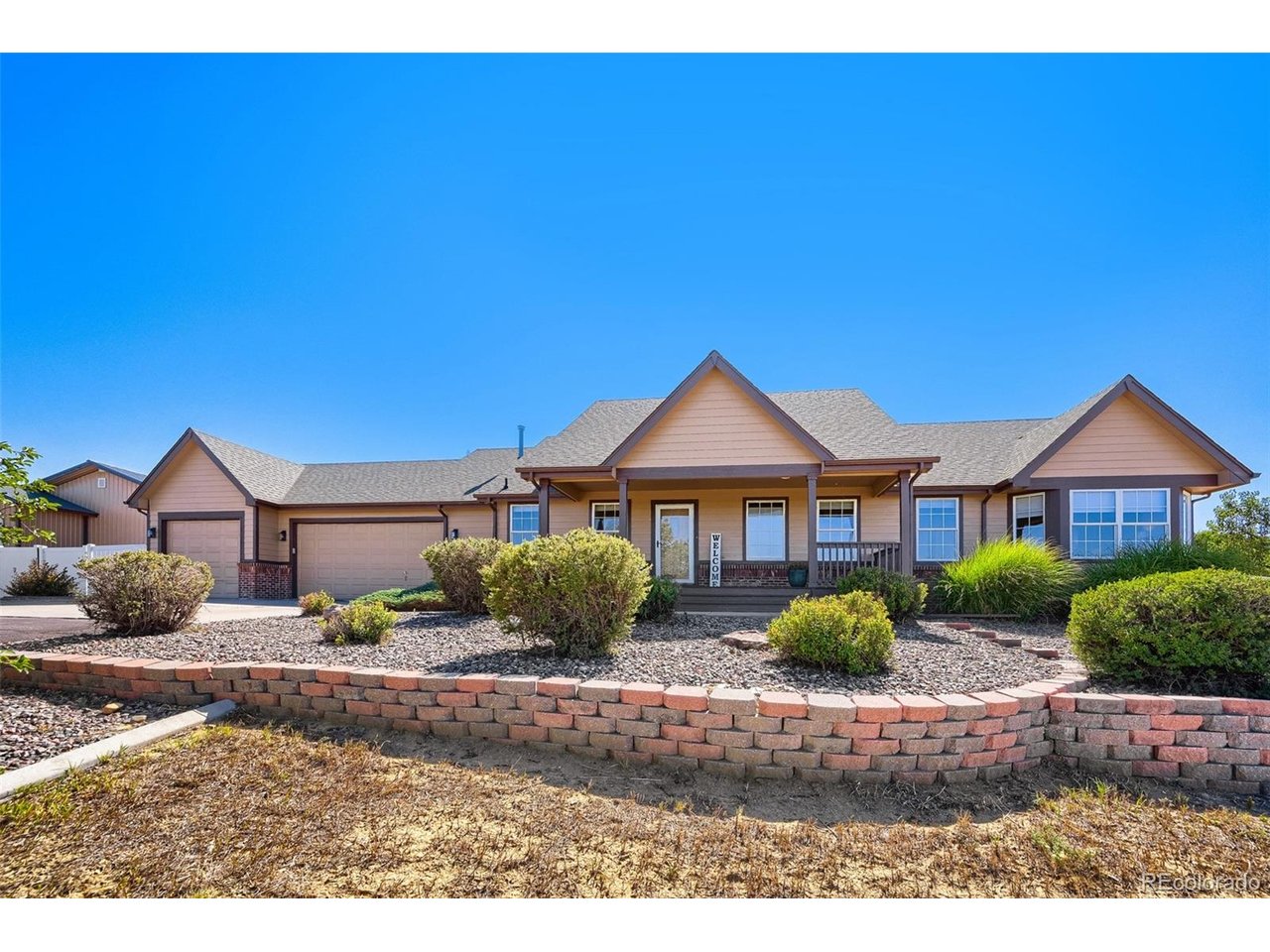 Welcome home to this beautifully remodeled ranch nestled in the highly sought-after Todd Creek Farms community. Situated on a sprawling 1.81-acre lot, this exceptional property seamlessly blends modern luxury with expansive outdoor living, featuring a massive 1,984-square-foot outbuilding alongside an attached 3-car garage-perfect for all your recreational toys, hobbies, or workshop needs.Inside, the bright and airy main level boasts high vaulted ceilings and a cozy gas fireplace in the living room. The formal dining room flows effortlessly into a gorgeous kitchen, fully updated with stainless steel appliances, striking leathered granite countertops, and a sunny breakfast nook overlooking the massive backyard. Retreat to the private primary suite, which showcases a show-stopping custom walk-in closet with premium built-ins. The spa-like primary bath features a deep soaking tub and a sleek double vanity. A spacious secondary bedroom sits just across the hall from a convenient full bathroom.The fully finished, recently updated basement offers incredible versatility with fresh paint and stylish new flooring. It features a dedicated office behind elegant glass French doors (easily a 5th bedroom) and a private bedroom suite with a beautifully designed, modern en-suite bath. A third spacious bedroom, an additional full bathroom with a stunning contemporary vanity, and a large, discrete storage room complete this lower level.From the multiple outdoor seating areas and custom playground to the immaculate, turnkey interior, absolutely everything is newer and move-in ready. The exterior was just painted, a new roof will be installed prior to closing and the buyer will receive a Platinum Select Home Warranty for one year after closing! Schedule your tour today before this rare Todd Creek Farms gem is gone!