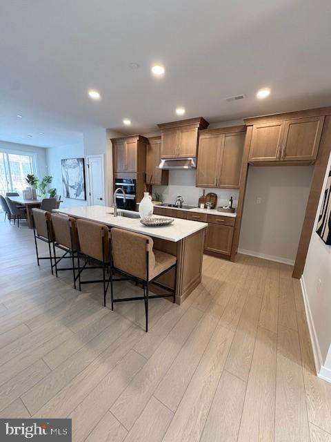 Move-In Ready! Beautiful designer curated finishes and deck included in the price. You’ll feel right at home in the Brentford starting with an inviting foyer that opens onto the spacious flex room with views to the expansive great room with rear yard access. The well-designed kitchen is highlighted by a large center island with breakfast bar, plenty of counter and cabinet space, and sizable pantry. Highlighting the elegant primary bedroom suite are dual walk-in closets and beautiful primary bath with dual-sink vanity, luxe shower, and private water closet. Secondary bedrooms feature generous closets and shared hall bath with dual-sink vanity and linen storage.  Finished basement downstairs. Additional highlights include a convenient powder room, everyday entry, second floor laundry, and additional storage throughout.