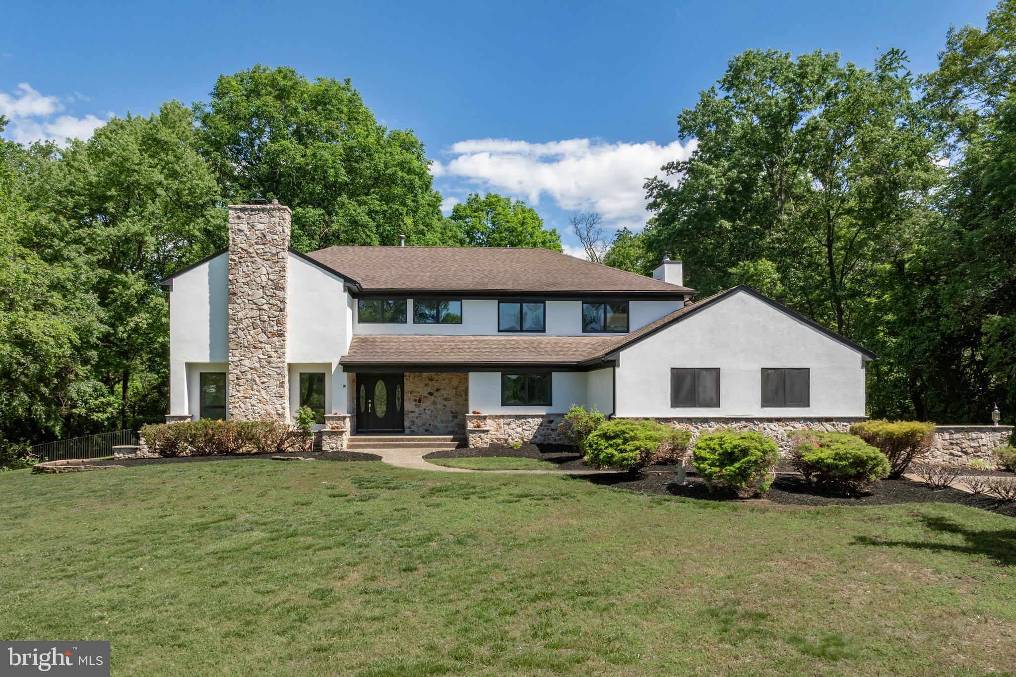 Talk About A Renovation Done RIGHT… Outstanding In Every Way.It’s all in the details… and this one is missing absolutely none.Set well back from the street with a long, winding driveway, this executive-style estate home sits proudly on 3+ acres of pure fun in the sun, offering over 4,000 sq. ft. of pure excellence, privacy, and resort-style living.Step inside and prepare to be impressed by soaring cathedral ceilings and stunning white oak-inspired luxury vinyl plank flooring cascading throughout the expansive first level.The formal living room makes an unforgettable first impression with a striking slatted feature fireplace, beautifully flanked by oversized windows pouring in streams of natural light, while custom inset bookshelves add warmth, character, and sophistication.The spacious dining room is ideal for entertaining and offers access to the large covered porch, where peaceful views of the backyard, pool, and wooded landscape create the perfect backdrop.The gourmet chef’s kitchen is nothing short of spectacular. Custom cabinetry, a dramatic 10-foot center island with gorgeous quartz waterfall countertops, stainless steel appliance package, dual ovens, gas cooktop, wine fridge, prep sink, porcelain farmhouse sink, elegant gold accents, and timeless glass subway tile… every detail was thoughtfully designed to impress.The breathtaking family room features dramatic cathedral ceilings and multiple two-story windows framing picturesque views of the pool and lush grounds while flooding the home with abundant natural light.Convenience meets style with a beautifully appointed powder room, mudroom with laundry hookups, and access to the oversized two-car garage.Upstairs, the generously sized primary suite offers a true luxury retreat, highlighted by a drop-dead gorgeous ensuite bath that will simply take your breath away — featuring a stunning soaking tub with designer backsplash detail, elegant glass-enclosed shower, sophisticated cabinetry, and beautiful gold embellishments.   Framed by elegant glass French doors, the primary suite balcony overlooks the sprawling backyard oasis, creating a serene retreat with picturesque views.Three additional second-floor bedrooms await, including a desirable princess suite with private ensuite bath, plus an additional hall bath with convenient shared access from both the hallway and adjoining bedroom. A second-floor laundry room makes everyday living effortless.The full basement stretches the entire footprint of the home and offers access from two separate staircases, creating endless possibilities for future living, entertaining, fitness, recreation, or storage.And then… the backyard.Step from the kitchen onto the massive covered patio overlooking lush acreage and the sparkling inground pool, where the party never ends and everyday life feels like a private resort.This is more than a home… it’s a statement. A lifestyle. A renovation executed to perfection.