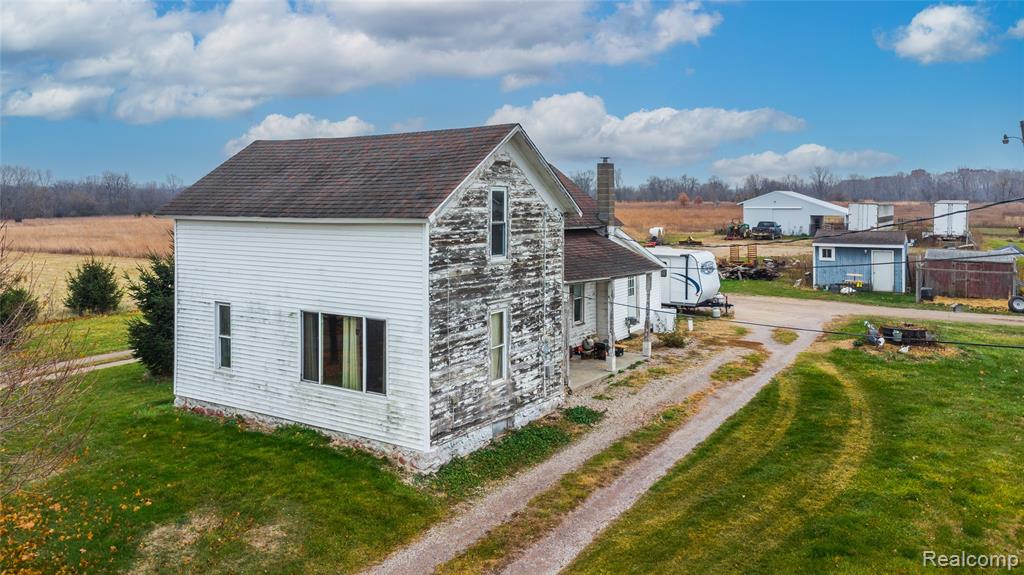Great 33 Acre Farm House 1.5 Story / Pole Barn / 1930 Original Stone Basement With Block Basement Adddition / Live Stock & Crop Ready Farm / House Could Use Some Floor Leveling Before You Deep Dive Into The Remodel / Property Will Also Allow For A Split If You Want To Build New / Lots Of Road Frontage And Deep Lot / Well And Septic And Natural Gas / Great Opportunity For Homesteading and Hunting In Your Own Backyard / Owosso Township & Owosso Schools