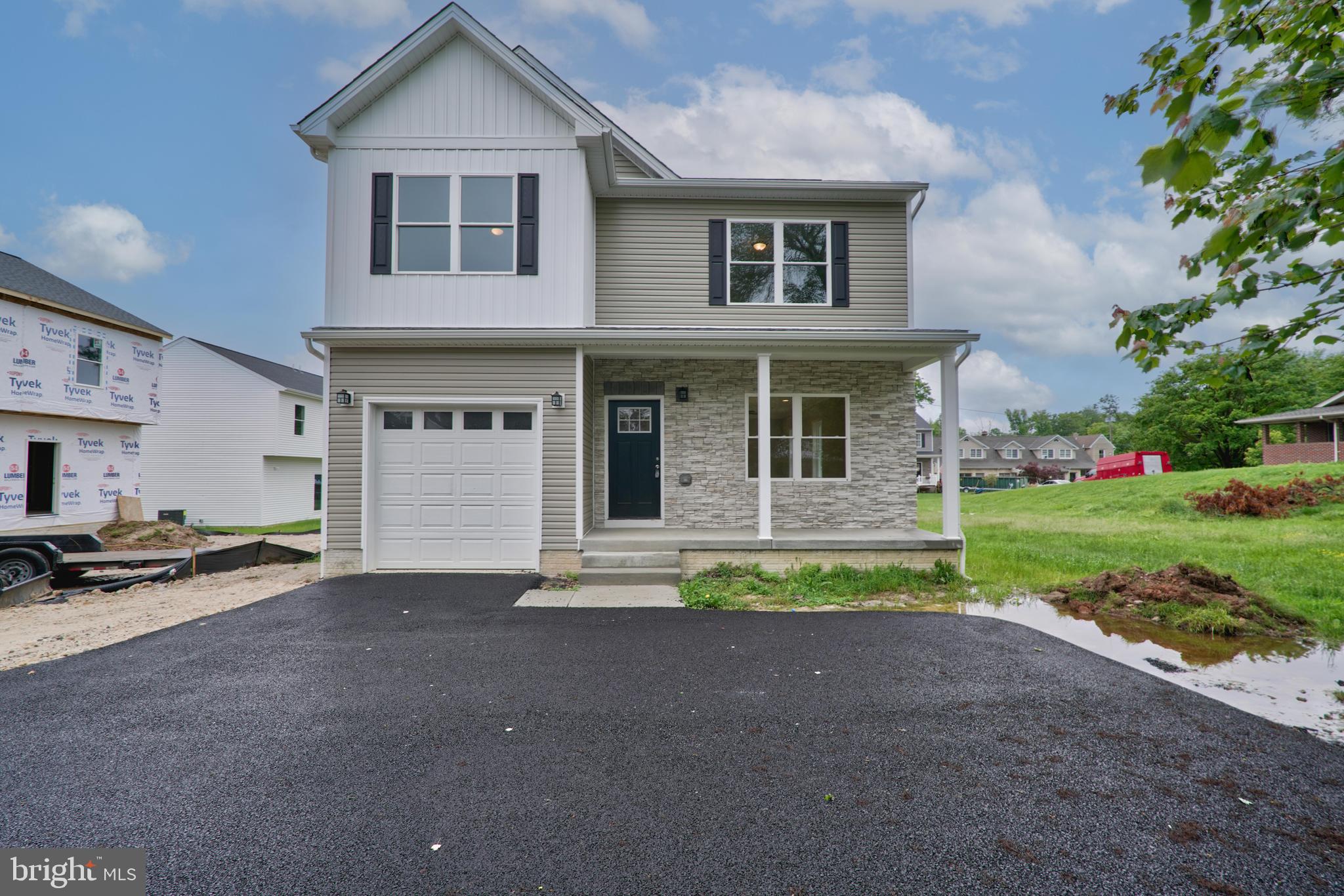 Welcome to 7412A Belmont Avenue  SAMPLE HOME PICK YOUR OWN FINISHES , a captivating residence that combines tasteful design with functional living space. This magnificent 4-bedroom, 2.5-bathroom home, located in Dundalk, Maryland, is the perfect place to create lasting memories with family and friends. As you step through the front door, you are greeted with a spacious open-concept living area, flooded in natural light, highlighting the gleaming hardwood floors that run throughout the main level. The modern kitchen is a home chef's dream, complete with pristine granite countertops, top-of-the-line stainless steel appliances and on trend white cabinets - a perfect gathering spot for casual meals or conversation. Upstairs, you'll discover two full bathrooms and four generously sized bedrooms, including the luxurious primary suite. This tranquil retreat boasts a large closet and an en-suite bathroom featuring modern finishes, creating the ultimate oasis for relaxation. The unfinished lower level offers even more potential living space with high ceilings, an egress window and rough ins for a bathroom. Outdoor living and entertaining will be a delight with a generous sized backyard, the ideal backdrop for summer barbecues, outdoor games, or simply enjoying the changing seasons. Keep your vehicles looking sharp with the one car garage with additional room for two cars on the asphalt driveway. Located close to abundant dining, shopping, and entertainment options, 7412A Belmont Avenue offers the suburban dream. Don't miss out on the opportunity to own this beautiful home, where every detail has been thoughtfully considered to create a warm, inviting environment. Book your private showing today and come see for yourself what makes this house a perfect place to call home. SAMPLE HOME NEW CONSTRUCTION. PICK YOUR OWN FINISHES.
