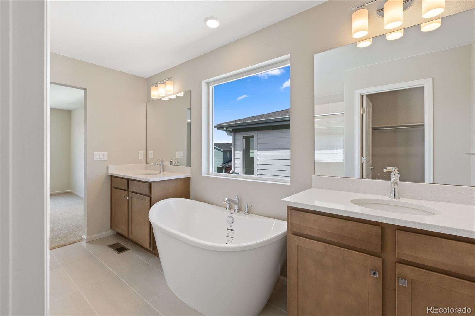 Ask about 4.99% Fixed Rate!!! Welcome to your new home! This enchanting 2-story residence is now available for sale, offering a harmonious combination of sophistication, functionality, and energy efficiency.As you step through the front door, the spacious and well-lit living spaces welcome you. This home features 4 bedrooms, providing ample space for family and guests. The primary bedroom boasts a private ensuite bathroom, while the additional bedrooms offer convenience and style.The heart of the home is the elegant kitchen, adorned with natural 36" cabinets, a captivating kitchen backsplash, and pristine white quartz countertops. The large island not only adds extra prep space but also serves as a focal point for gatherings. Chrome accents throughout the kitchen add a touch of modern sophistication.Convenience is at the forefront of this home's design with the main floor hosting a versatile office, ideal for those who work from home or need a dedicated space for productivity.Situated on a park front, home-site, this residence offers both privacy and the luxury of being adjacent to a private park. Picture yourself enjoying the serene views from your patio or exploring the nearby green spaces.Strategically located close to upcoming town center, dining options, parks, and trails, this home ensures that you have everything you need within reach. The energy-efficient features make this home not only environmentally friendly but also a smart investment for the future.Experience the perfect blend of modern living, style, and comfort as you step into this beautiful residence. Don't miss the chance to make this house your home. Schedule a viewing today and embark on a new chapter of luxury living!