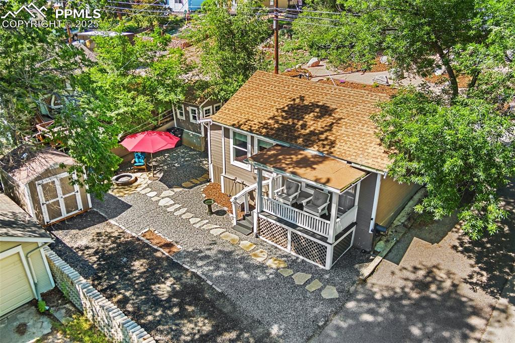 An artists dream! Cozy cottage with separate studio (not included in sf but around 100 sf) perfect for art, music or home office! Completely updated with top quality appliances, newly redone engineered foundation, and built to last! So close (walking distance!) to the best that the West Side, Old Colorado City and downtown Colorado Springs have to offer. Build in 1922 but almost like a brand new house from the inside out, using all the latest construction techniques like vinyl windows, new electrical, the works. Even a new roof being installed prior to closing. Wonderful outdoor sitting area, storage shed (with solar lights and work bench), walking and biking access to all the good stuff, makes this one practically perfect!