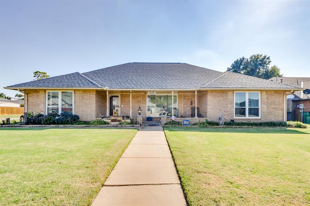 Well maintained home on a desirable corner lot featuring updates throughout. This property offers new champion windows, fresh interior paint, and new flooring for a clean updated look. The roof and the hot wter tank was replaced in 2023, providing added peace of mind. Outside, enjoy a sprinkler system to keep the lawn looking great year round.  Also, there is a 25' by 14' workshop that offers excellant space for projects, storage, or hobbies. Plus, a 17' by 9' storage building with tons of of cabinet space and a seperate room on the side for lawn equipment. This home is conveniently located with easy access to shopping, dining, and major highways. Move in ready!
