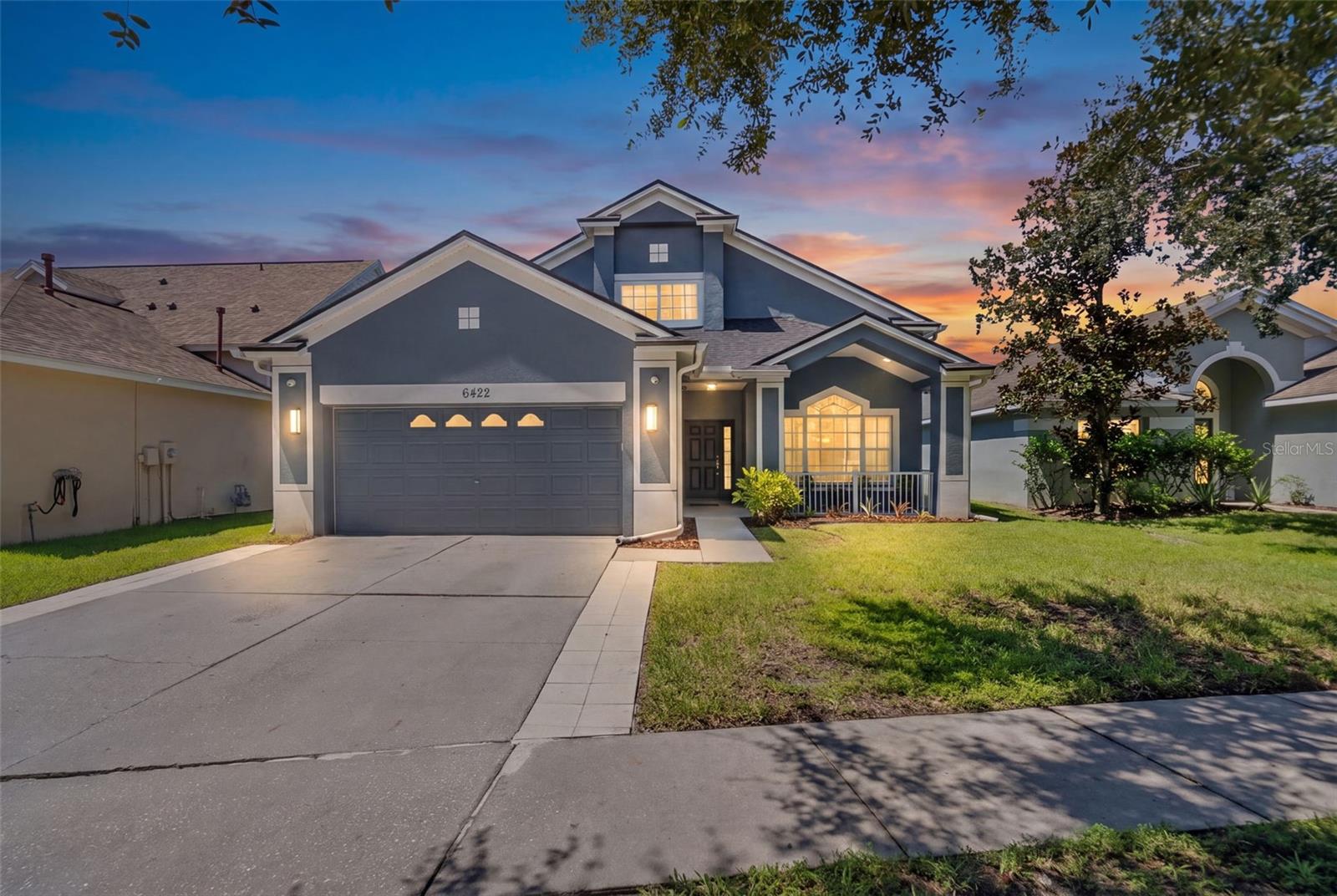 Welcome to FishHawk Ranch living at its best. Beautifully presented and move-in ready, this spacious 4-bedroom, 2.5-bath home offers 2,170 square feet of thoughtfully designed living space with a first-floor primary suite, an upstairs loft, inviting indoor-outdoor living, and storage in all the right places. Go inside to a bright, open interior with 9-foot ceilings and luxury vinyl flooring throughout the main living areas. Just off the entry, a spacious multipurpose room can serve as a home office, den, formal dining room, or additional sitting area. The heart of the home brings the kitchen and family room together in an open gathering space ideal for daily living and entertaining. The kitchen features granite countertops, generous cabinetry, a custom range hood, and an oversized farmhouse-style copper sink that adds warmth and character to the space. The first-floor primary suite feels like a true private retreat, thoughtfully separated from the three upstairs bedrooms and offering its own direct access to the screened lanai. A spacious walk-in closet and updated en suite bath with dual sinks, garden tub, extensive floor-to-ceiling tile, a separate glass-enclosed shower with rainfall and handheld shower head, and a private water closet complete the suite. Upstairs, three additional bedrooms surround an open loft ideal for a second living area, playroom, study, or media space. Thoughtful, practical details continue throughout the home. The interior laundry room is exceptionally functional, with enclosed cabinetry and open shelving above the washer and dryer, plus a long custom-built wood folding counter with a full-length storage shelf below. Ample attic storage provides plenty of room for seasonal items and household extras, while ceiling-mounted storage in the two-car garage adds valuable additional space without sacrificing the garage floor. Indoor-outdoor living is a highlight, with sliding doors opening from the main living area to a covered, screened lanai overlooking the fenced backyard. The generous outdoor space is ready for relaxing, dining, and entertaining, with an electrical connection for a hot tub or spa already in place. A dedicated fenced dog run gives pets their own outdoor space, with convenient pet-door access directly from the screened lanai. Reclaimed-water irrigation adds a practical Florida advantage for everyday lawn and landscape watering. Beyond the home, enjoy the lifestyle that makes FishHawk Ranch so sought after, with highly regarded local schools, miles of recreational trails, community pools and aquatic amenities, fitness centers, parks, a skate park, playgrounds, tennis and pickleball courts, basketball courts, and recreation facilities. The home's setting within the Bridges offers a welcome balance: tucked away from the community's busier corridors, yet close enough to enjoy an evening stroll to Park Square for dining, farmers markets, movie nights, the splash pad, and neighborhood events. It's a location that lets you enjoy the energy and connection of FishHawk Ranch when you want it, then come home to a quieter residential setting. With generous living spaces, a private first-floor primary retreat, abundant storage, inviting outdoor areas, and access to the schools and amenities that draw so many to FishHawk Ranch, this is a home designed to be lived in, enjoyed, and made your own.