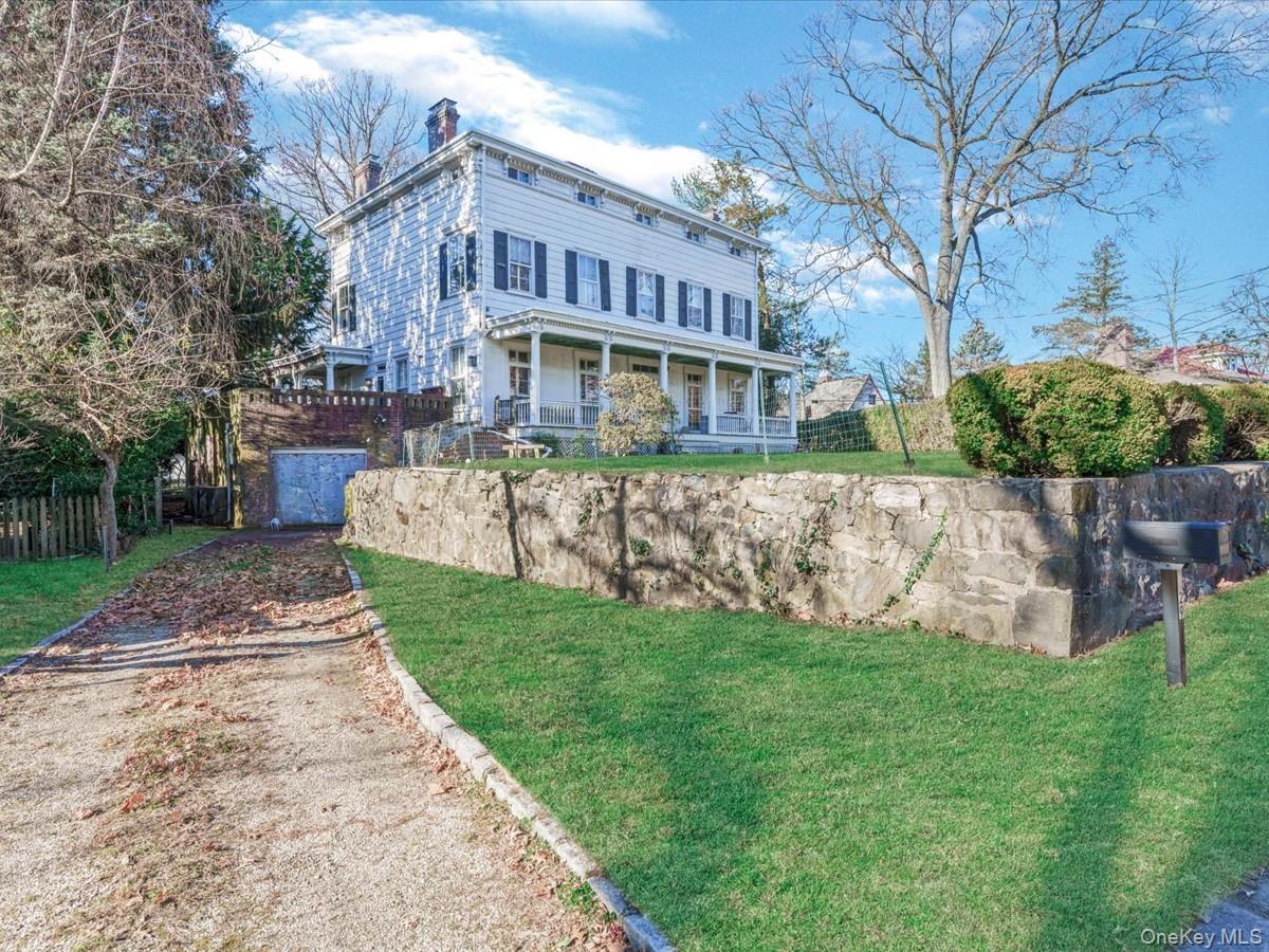 If you are looking for a large, prestigious home, we have it right here at 29 Center Drive in Douglas Manor, Douglaston, Queens, New York. This is a beautifully preserved and expertly restored historic property that appears today with updates including modern features.  Encompassing approximately 6000 sq ft main house, a 19th-century restored dating to the 1850’s. The grounds set the tone for elegance,warmth and prestige. Quite possibly the best privately-owned pre-revolutionary home remaining in Queens, New York.This is a rare opportunity to own a Classic Greek revival home in the exclusive waterfront community of Douglas Manor. Offering approximately 6,000 sq. ft. across four levels with 6 bedrooms, 2.5 baths, 10 fireplaces and an elevator to start.On the first floor, first thing you notice is 10-foot-wide foyer and 13-foot ceilings that goes from one side of the home to the other, 30 feet long, connecting all the rooms for a nice flow throughout the first floor.  You’ll appreciate the Large Formal Dining Room W/ Fireplace and original plaster crown moldings.  The full Chef’s kitchen with walk in pantry & half bath will amaze you with top-of-line stainless steel appliances connected to a Family Room W/ Fireplace.  The Living Room adjacent to the dining room also has a Fireplace. The entire first floor offers larger windows than standard windows. What you don’t see is the full-size elevator, yes, The second floor has 4 Bedrooms, each with a fireplace, 2 full bathrooms with a 10-foot-wide hallway, room for all type of furniture.The third floor has 2 bedrooms, home office and storage room. More than enough space for additional bathroom if needed.The basement is large enough for the grand family room with 2 fireplaces, wine cellar, full utility room and entrance to the garage.The patio is located off the kitchen and yes, it has a fireplace as well. The wrap around porches are a classic design that never goes out of style.Updated throughout with Geo-thermal Heat & AC controlling 3 zones, 220 electrical and professional elevator so discreet you’ll have to ask where it is. More details: This residence built between 1848 – 1850 now blends authentic Greek revival architecture with modern day comfort. Original details from 1850 include Doric-columned porches, Queen Anne doors, 13-foot ceilings, plaster crown moldings, and ten distinctive fireplaces throughout the home. Thoughtfully updated, the home features 3-zone geothermal heating and central air, a discreet full-size elevator, and a fully renovated chef’s kitchen with high-end stainless-steel appliances: Traulsen Refrigerator, Subzero freezer, 48” Thermador Stove & matching Vent and Bosch dishwasher surrounded by oversized windows, and exceptional natural light. The expansive dining area welcomes gatherings of any size, framed by large windows and multiple fireplaces. The finished basement provides additional entertainment space, storage, and a wine room. The top floor offers access to the iconic octagonal cupola with sweeping neighborhood views, with approved plans to raise the roof and replace the patio deck off the kitchen. Located in the waterfront community of Douglas Manor which offers a true lifestyle with a private dock, playground, security, and close proximity to the Douglaston Club, LIRR, schools, and major roadways. Douglas Manor is more than a place to live, it's a lifestyle. This home Known as the historic Allen-Beville House (Google it), has a remarkable history , it is landmark property and is recognized by the NYC Landmarks Preservation Commission and the National Register of Historic Places. Annual association fee: $900.