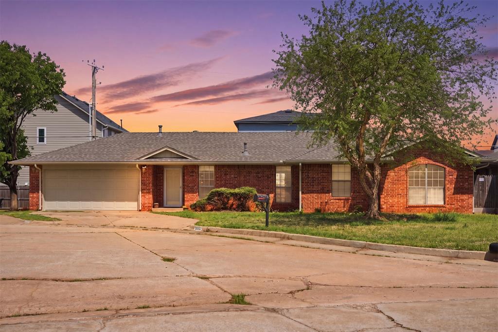 Welcome to this beautifully maintained, move-in-ready home located in the heart of Oklahoma City. Combining a spacious open floor plan with stylish modern updates, this property is perfect for both quiet relaxation and vibrant entertaining.Interior HighlightsInviting Living Space: The bright and airy living room features high vaulted ceilings, plush neutral carpeting, and a cozy corner fireplace with a custom mantel—the perfect focal point for gatherings.Chef’s Kitchen & Dining: The kitchen boasts crisp white cabinetry, modern appliances, and ample counter space. It flows seamlessly into a dedicated dining area highlighted by a stunning contemporary chandelier and large sliding glass doors that flood the space with natural light.Serene Primary Suite: Retreat to a spacious primary bedroom featuring a ceiling fan and a private en-suite bathroom equipped with a double vanity and sleek finishes.Versatile Layout: Additional bedrooms offer flexibility for a home office, guest rooms, or a hobby space, all finished with consistent neutral tones and plenty of closet storage.Exterior & LocationCurb Appeal: The exterior showcases a timeless brick facade complemented by a well-manicured lawn and a mature shade tree.Outdoor Living: Step through the sliding doors to a private, fully fenced backyard, offering a safe space for pets or weekend BBQs.Convenience: Situated in the 73120 zip code, you are just minutes away from local shopping, dining, and easy highway access.Property Details at a Glance:Features: Vaulted ceilings, fireplace, updated lighting, 2-car garage, and fenced backyard.This home is a must-see to truly appreciate the craftsmanship and care throughout. Schedule your tour today!