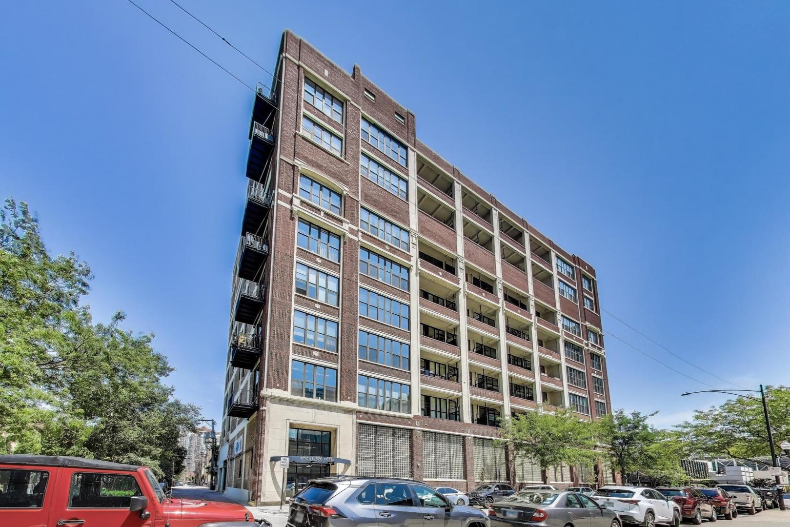 Nothing to do but move in-an impeccably updated and rarely available corner unit at Chess Lofts with stunning, unobstructed northern views of the Chicago skyline and Lake Michigan. Enjoy morning coffee on your private balcony as the sun rises over the lake, and wind down with a glass of wine on the rooftop deck as the city lights sparkle. This spacious 2 bed, 2 bath home features soaring 12-foot concrete ceilings, exposed brick, and all new floors throughout, blending industrial charm with modern elegance. The open-concept layout is ideal for entertaining or relaxing in style. The newly renovated kitchen boasts custom cabinetry, premium black steel appliances, oversized quartz countertops, and sleek tile backsplashes. The primary bathroom is a spa-inspired retreat that has been completely professionally updated-no detail overlooked. High-end lighting and in-unit laundry add convenience. Two parking spots available for $30,000 each-a rare value in the booming South Loop. Just minutes from the Loop, McCormick Place, Museum Campus, Soldier Field, and Lake Michigan, with easy access to Lake Shore Drive and public transit, this home delivers comfort, style, and breathtaking views.