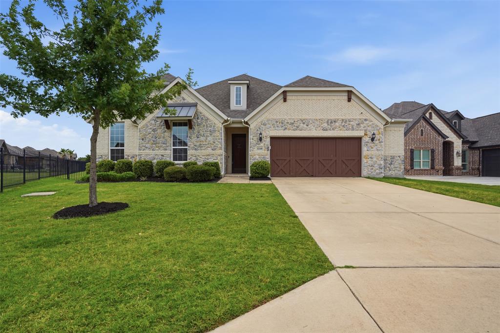 Experience refined resort living in this stunning 4 bedroom, 3.5 bath home in The Resort on Eagle Mountain Lake, a prestigious 24-hour guarded and gated community. Perfectly positioned on the 4th fairway, the home offers sweeping golf-course views from the main living areas, kitchen, primary suite, and bath.Inside, an open-concept layout welcomes natural light and panoramic views. The gourmet eat-in kitchen is built for everyday comfort and entertaining, featuring a large granite island, double ovens, gas cooktop, and farmhouse sink.All four bedrooms and three full bathrooms are conveniently located on the main floor for optimal accessibility. The private primary suite is tucked away for a true retreat feel and features an elegant ensuite bath with dual sinks, a soaking tub, a walk in glass shower, and an expansive walk-in closet. A second bedroom with its own ensuite provides an excellent setup for guests or multigenerational living, while the third and fourth bedrooms share a well-appointed bath and are positioned in a separate wing for natural separation and privacy.Upstairs, a spacious bonus room with half bath offers flexible space for a media room, game room, retreat, or entertaining area. Outside, a covered patio overlooks the manicured golf course and oversized lot—perfect for peaceful mornings, sunset gatherings, or relaxed everyday living.Residents enjoy world-class amenities including an 18-hole championship golf course, clubhouse with restaurant and bar, resort-style pools, fitness center, pickleball and basketball courts, private boat ramp, dock, sandy beach, playgrounds, walking trails, and the beauty of Eagle Mountain Lake.With all beds down, two ensuite bedrooms, separated secondary rooms, an exceptional upstairs entertaining space, and serene golf-course views, this home delivers the luxury, privacy, and lifestyle buyers are looking for.