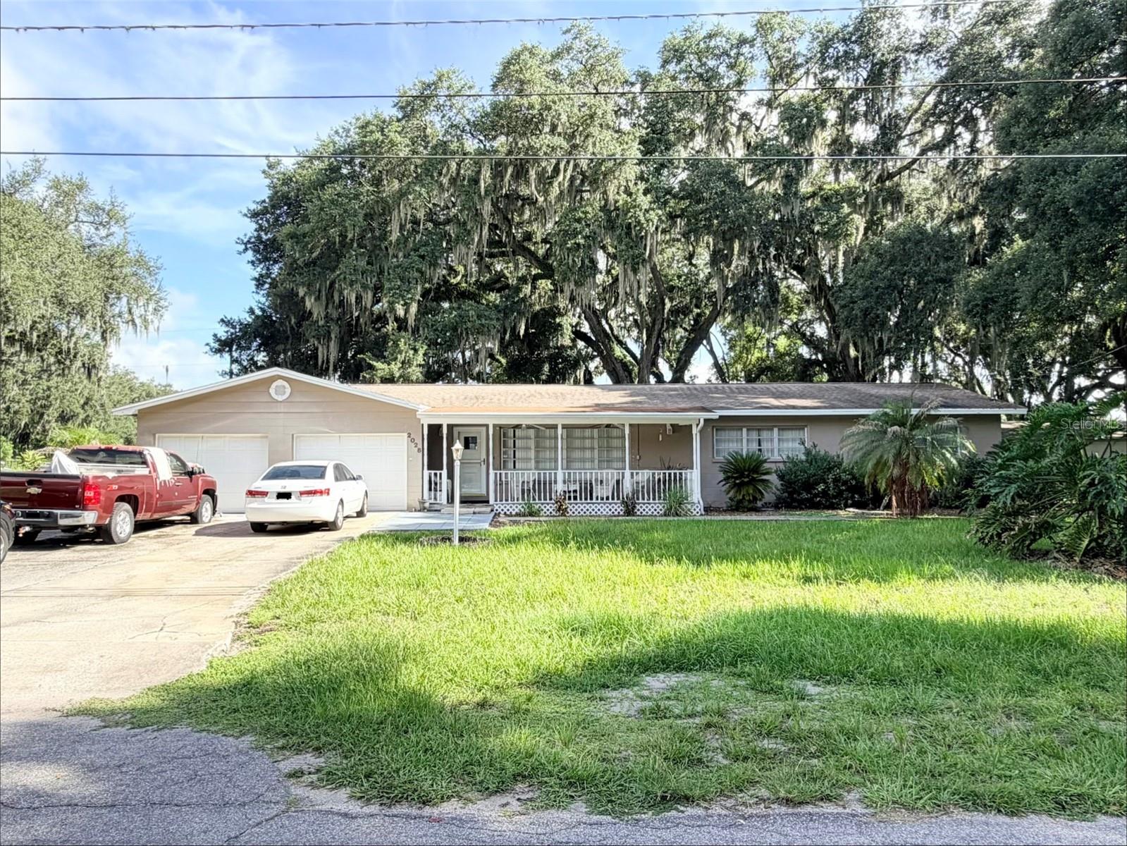 Fractional Ownership. Plant City 3 Bedroom Home on nearly half an acre. No HOA.Discover the opportunity to own this charming 3 bedroom, 2 bathroom block home on nearly half an acre in Plant City. Offering 1,456 square feet of living space, a 2 car garage and 2 sheds, this property combines the character of an established home with the flexibility and outdoor space that are becoming increasingly difficult to find.The oversized lot provides exceptional versatility with plenty of room for gardening, outdoor entertaining, recreational equipment, or future outdoor projects. With no HOA, you'll enjoy added flexibility to personalize and use the property in a variety of ways, subject to applicable local regulations. Conveniently located just minutes from historic downtown Plant City, you'll have easy access to local shopping, dining, schools, medical facilities, and Interstate 4. ***Property is being sold pursuant to court order. A Special Magistrate has been assigned with the right to sell. Occupancy issues are currently being resolved. Interior access is currently unavailable. Showings will commence once access is granted. This property provides outstanding potential for an investor to own nearly 1/2acre of land.*** Call agent for more details.