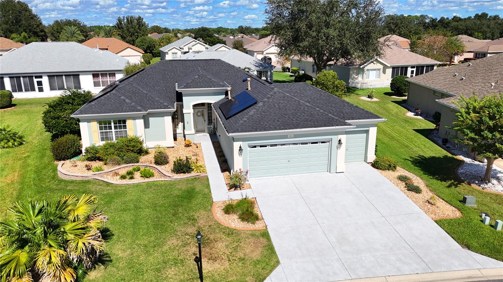 Pristine Captiva with Standout Curb Appeal.  This immaculate concrete block and stucco Captiva combines standout curb appeal with an open floor plan and thoughtful use of every square foot.  Designer wall colors, upgraded ceiling fans, decorative window casings, and abundant storage bring style and functionality throughout, while several solar tubes provide natural light.Kitchen and Living Spaces.  The spacious eat-in kitchen features quartz countertops, a designer backsplash, a gas range, upgraded appliances, a pantry, and a center island.  A separate butler's pantry offers additional storage and a second refrigerator.Combination living/dining room is light and bright and gives access to the climate controlled lanai and the den.  Beautiful laminate flooring, solar tube and lots of windows makes this feel comfy and relaxing. Den features built-in bookcase.  Lanai is climate controlled with a paver patio outside.Primary Suite and Guest Accommodations.  The primary suite features a double-door entry, a bay window, and an en suite bath with a spacious walk-closet and upgraded storage reminiscent of a California-style closet system.  The equally inviting guest bedroom has a conveniently located guest bath nearby.Energy Features and System Updates.  Energy-conscious features include radiant barrier insulation in the attic and seller-installed solar panels reducing monthly bills substantially. In addition to the home's interior, the oversized two-car garage, golf cart garage, and lanai are climate controlled. HVAC (2021), roof shingles (2022), Solar PV system (2022) and water heater (2023).  The solar panels make this home energy-efficient with options (may be connected to two back up batteries and a generator to become fully energy-independent). Garage and Storage.  The oversized two-car garage and separate golf cart garage boasts practical features for everyday convenience: Racecar decking flooring, keyless entry, attic storage, utility sink and laundry hookups.  Also, climate controlled.Beautiful home located close to the Fitness Center.  Certainly a must see if you enjoy a move-in ready home with comfort in mind.