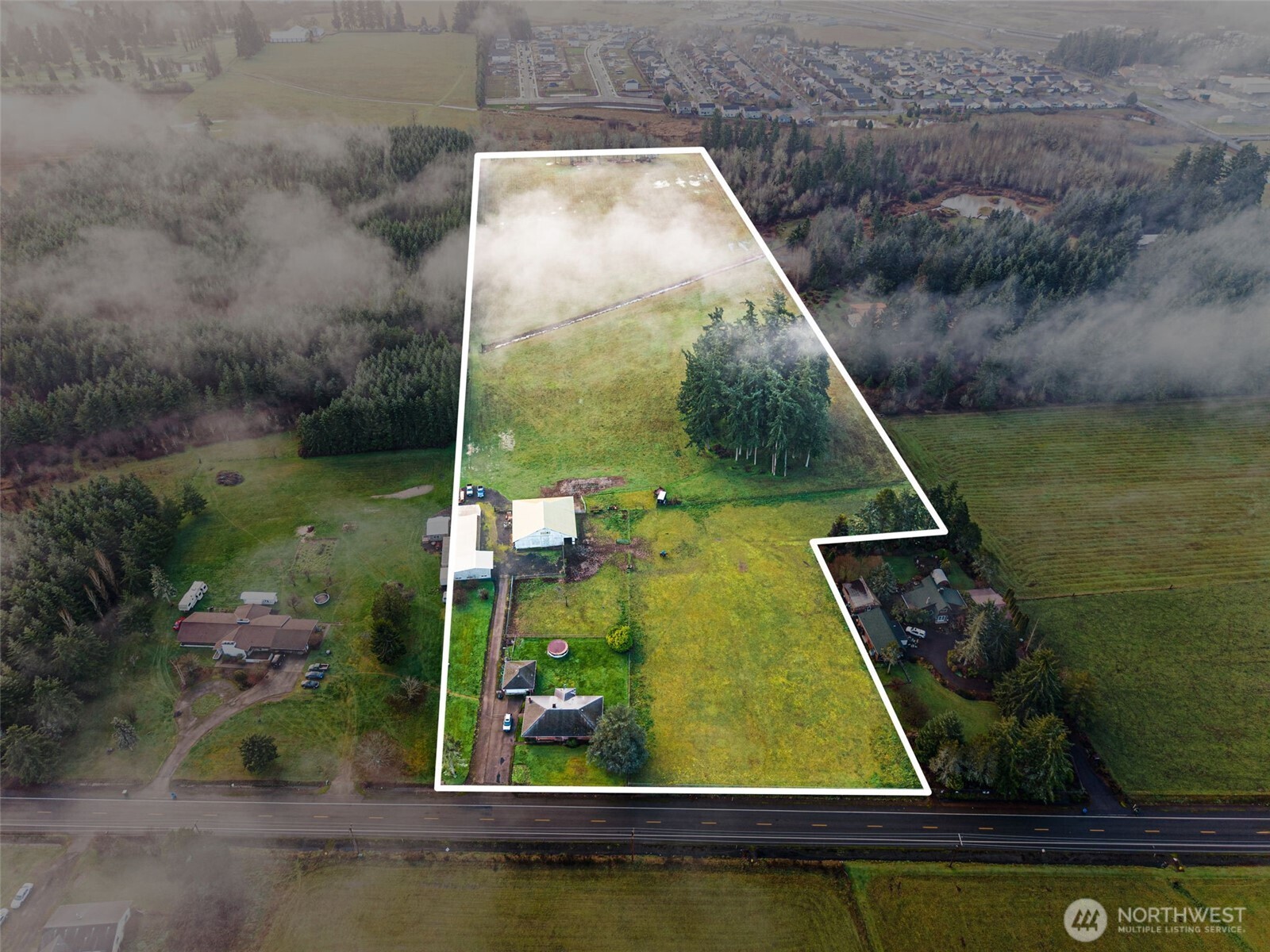 18.49 Acres zoned commercial, within the Chehalis Port District. Access from Exit 72 or Exit 74. Critical Areas Report completed and available. This property has a home and out buildings on the property, served by a well and septic. City of Chehalis water is in the street across from the driveway of this property. The City of Chehalis sewer connection is located on Rush Rd approx 2000 feet away. Buyer to confirm zoning meets their purpose.