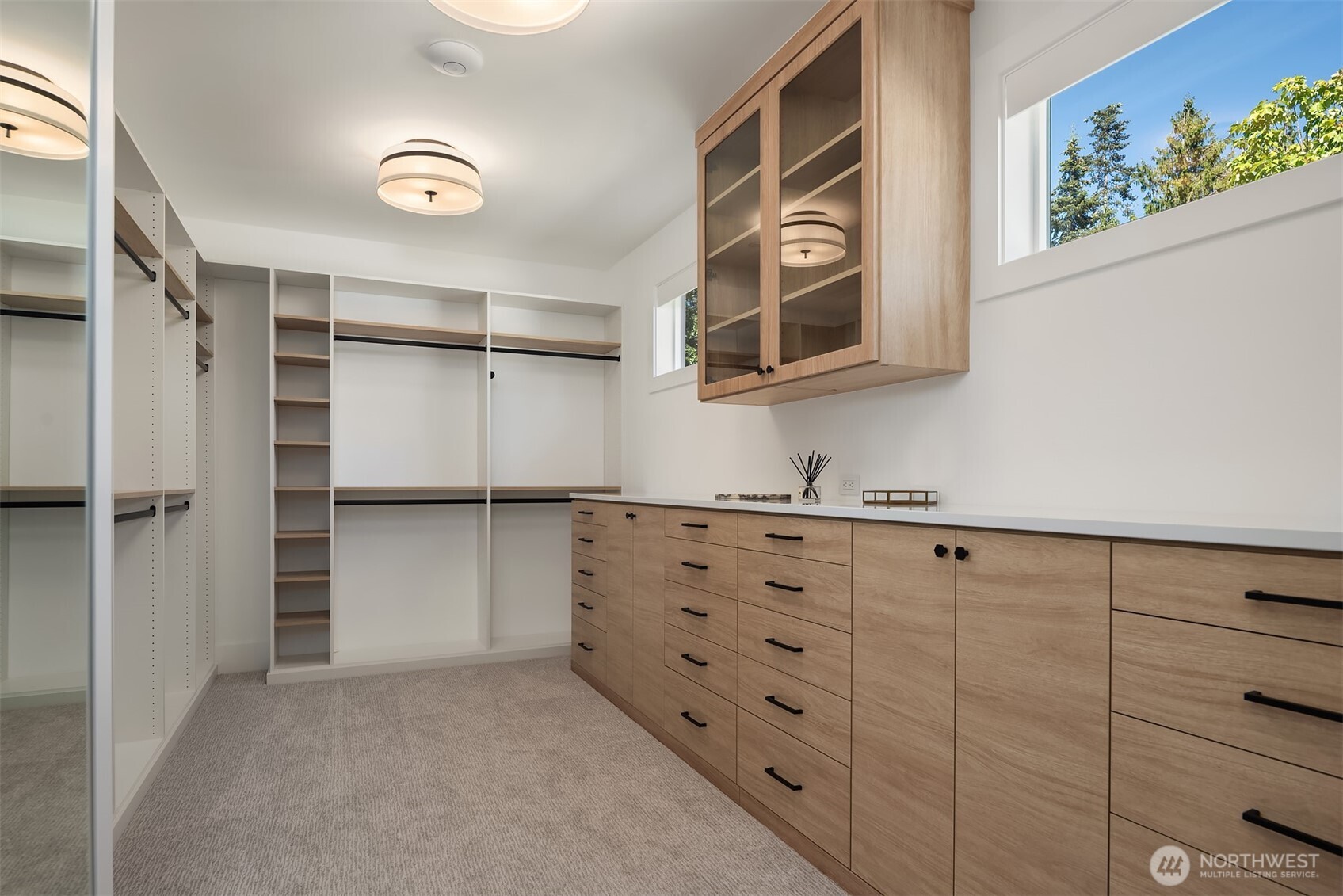 Expansive walk-in closet with custom built-ins