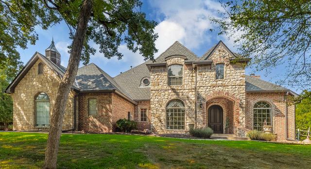 Welcome to your private oasis nestled just 2 miles east of I-35—offering the perfect blend of tranquility, space, and accessibility. This beautifully maintained 3,510 sq ft home sits on a serene, 2.06 acre wooded lot with mature trees providing natural privacy, a long driveway for seclusion, and a large front and back yard perfect for enjoying the outdoors.Step inside to find a warm and inviting kitchen featuring unique brick flooring, rich knotty alder wood cabinets, and a functional island—ideal for cooking and entertaining. The spacious living room, formal dining, study, and primary bedroom are all filled with natural light from oversized windows that bring the beauty of the outdoors in. Enjoy built-in surround sound in the living room for the perfect entertainment experience. The garage also has a below ground tornado shelter. The primary suite is a true retreat, complete with a cozy gas log fireplace, luxurious walk-in closet with center island, and a spa-like bath. Upstairs, you'll find four additional bedrooms and two full bathrooms, including a Jack-and-Jill layout. One bedroom is perfectly suited for conversion into a movie or entertainment room.Outside, enjoy the peaceful setting with patio speakers, a river rock dry creek, a treated round wood post fence with coated chain link in the backyard, and a 25' x 35' shop for hobbies, storage, or projects.With quick access to Oklahoma City via I-35, this property offers the perfect balance of rural privacy and city convenience. Don’t miss your chance to own this exceptional home!